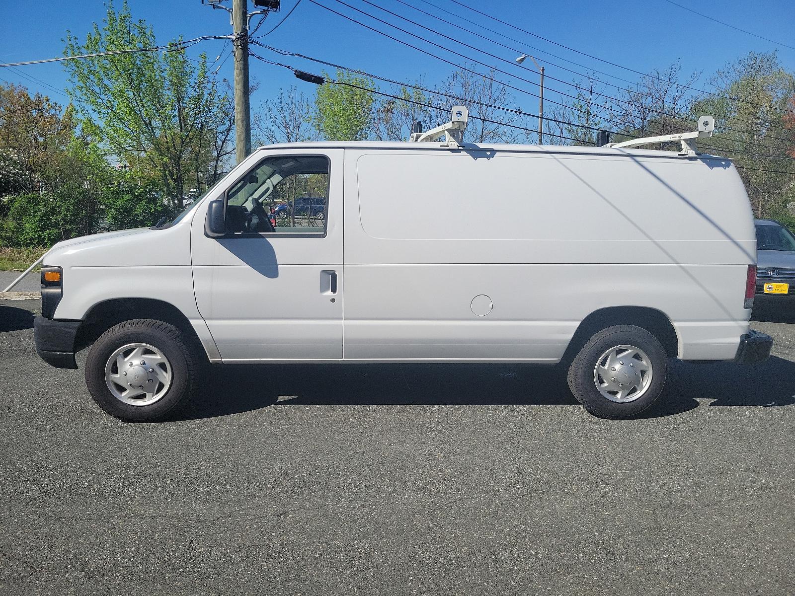 2014 Oxford White - YZ /Medium Flint - AE Ford Econoline Cargo Van Commercial (1FTNE1EW6ED) with an ENGINE: 4.6L EFI V8 FFV CAPABLE engine, located at 50 Eastern Blvd., Essex, MD, 21221, (410) 686-3444, 39.304367, -76.484947 - Introducing the 2014 Ford Econoline E-150 Commercial Cargo Van, dressed in a pristine white exterior. This is a reliable powerhouse built to serve all your commercial needs. Under the hood sits a robust 4.6L EFI V8 FFV capable engine, designed for performance and efficiency, thereby reinforcing Ford - Photo #6