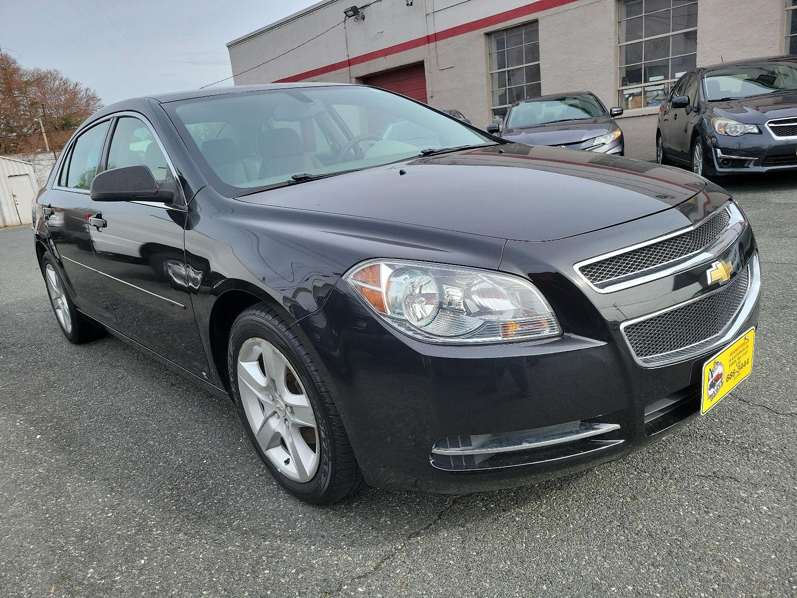 2009 Black Granite Metallic - 58U /Titanium - 83B Chevrolet Malibu LS w/1LS (1G1ZG57BX94) with an ENGINE, ECOTEC 2.4L DOHC, 16-VALVE, 4-CYLINDER VARIABLE VALVE TIMING MFI engine, located at 50 Eastern Blvd., Essex, MD, 21221, (410) 686-3444, 39.304367, -76.484947 - Experience the prowess of expert engineering with the 2009 Chevrolet Malibu LS w/1LS 4dr sdn ls w/1ls. It's not just a car but a statement on wheels. Coated in glossy black granite metallic - 58U exterior complemented by a classy titanium - 83B interior, this car embodies sophistication. The aesthet - Photo #2