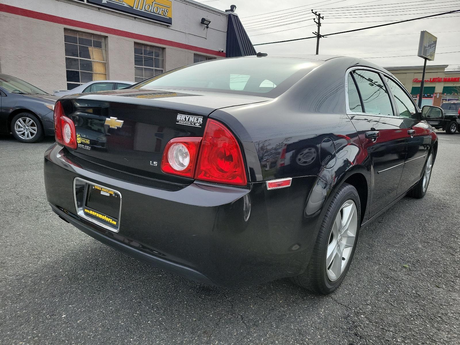 2009 Black Granite Metallic - 58U /Titanium - 83B Chevrolet Malibu LS w/1LS (1G1ZG57BX94) with an ENGINE, ECOTEC 2.4L DOHC, 16-VALVE, 4-CYLINDER VARIABLE VALVE TIMING MFI engine, located at 50 Eastern Blvd., Essex, MD, 21221, (410) 686-3444, 39.304367, -76.484947 - Experience the prowess of expert engineering with the 2009 Chevrolet Malibu LS w/1LS 4dr sdn ls w/1ls. It's not just a car but a statement on wheels. Coated in glossy black granite metallic - 58U exterior complemented by a classy titanium - 83B interior, this car embodies sophistication. The aesthet - Photo #3