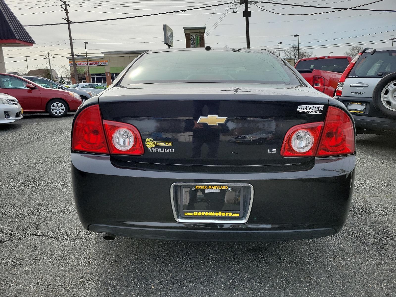 2009 Black Granite Metallic - 58U /Titanium - 83B Chevrolet Malibu LS w/1LS (1G1ZG57BX94) with an ENGINE, ECOTEC 2.4L DOHC, 16-VALVE, 4-CYLINDER VARIABLE VALVE TIMING MFI engine, located at 50 Eastern Blvd., Essex, MD, 21221, (410) 686-3444, 39.304367, -76.484947 - Experience the prowess of expert engineering with the 2009 Chevrolet Malibu LS w/1LS 4dr sdn ls w/1ls. It's not just a car but a statement on wheels. Coated in glossy black granite metallic - 58U exterior complemented by a classy titanium - 83B interior, this car embodies sophistication. The aesthet - Photo #4