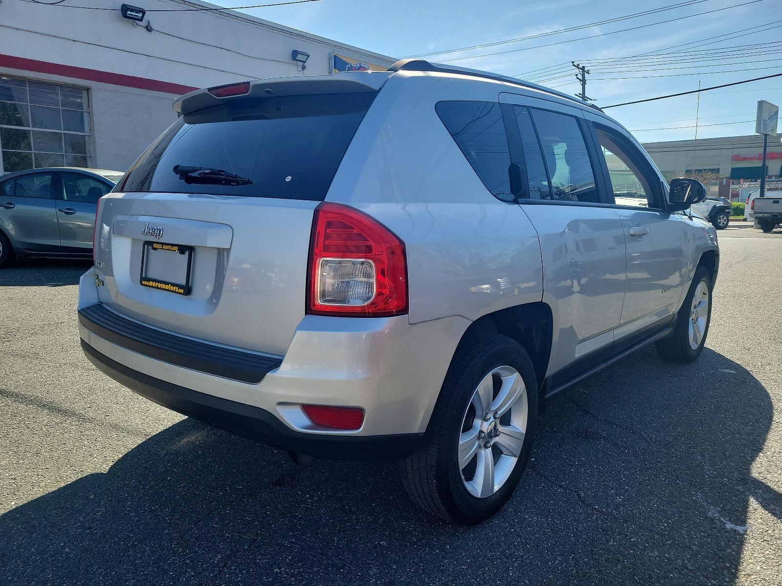2013 Bright Silver Metallic - PS2 /Dark Slate Gray Interior - C7DV Jeep Compass Sport (1C4NJDBB6DD) with an 2.4L DOHC 16V I4 DUAL-VVT ENGINE engine, located at 50 Eastern Blvd., Essex, MD, 21221, (410) 686-3444, 39.304367, -76.484947 - Experience the thrill of road adventure with the 2013 Jeep Compass Sport 4WD 4dr Sport! Boasting a bright silver metallic - ps2 exterior with a sleek, dark slate gray interior - c7dv, it's sure to elevate your driving experience to new heights. Under the hood, navigate terrains with ease, thanks to - Photo #3