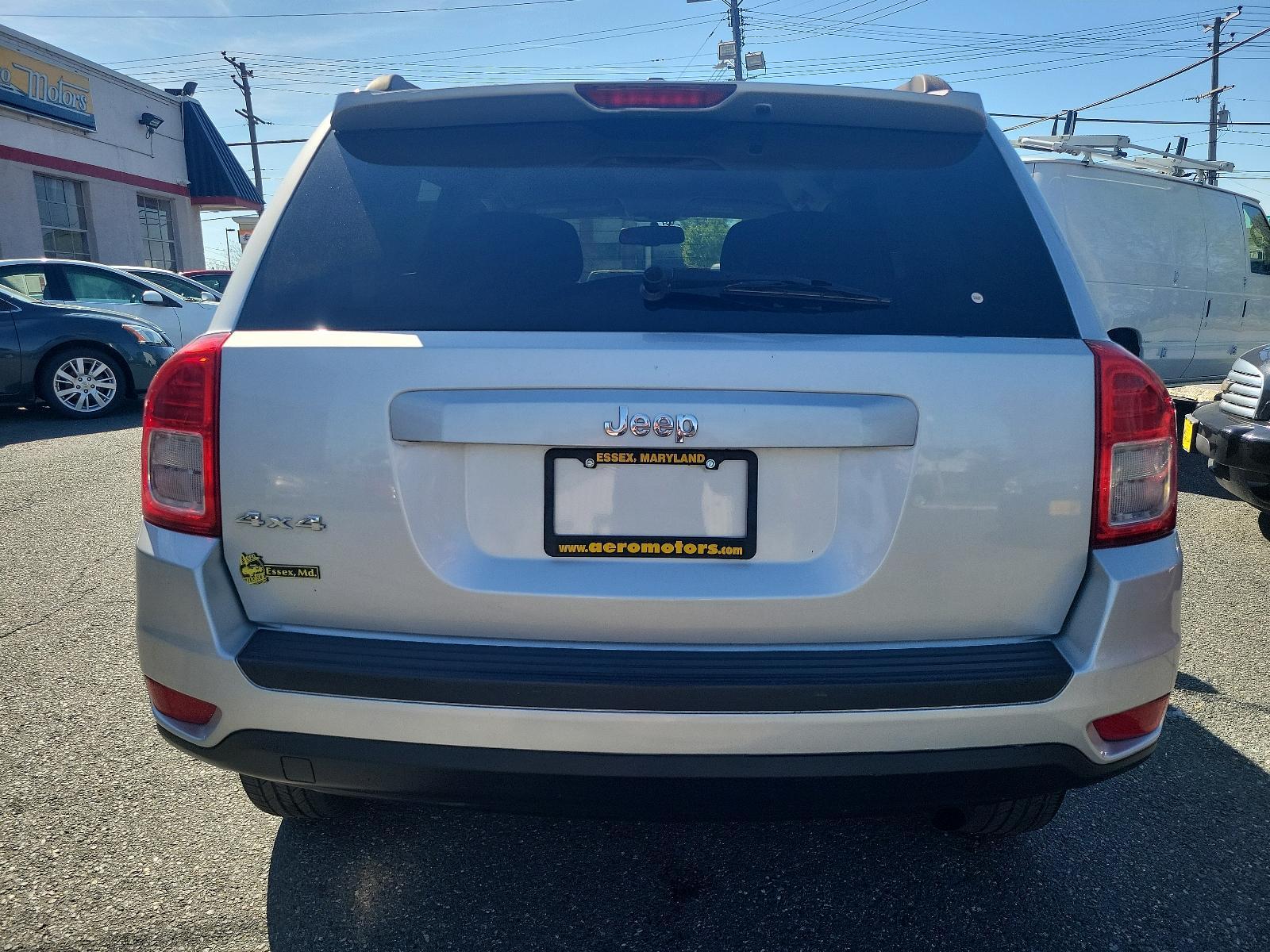 2013 Bright Silver Metallic - PS2 /Dark Slate Gray Interior - C7DV Jeep Compass Sport (1C4NJDBB6DD) with an 2.4L DOHC 16V I4 DUAL-VVT ENGINE engine, located at 50 Eastern Blvd., Essex, MD, 21221, (410) 686-3444, 39.304367, -76.484947 - Experience the thrill of road adventure with the 2013 Jeep Compass Sport 4WD 4dr Sport! Boasting a bright silver metallic - ps2 exterior with a sleek, dark slate gray interior - c7dv, it's sure to elevate your driving experience to new heights. Under the hood, navigate terrains with ease, thanks to - Photo #4