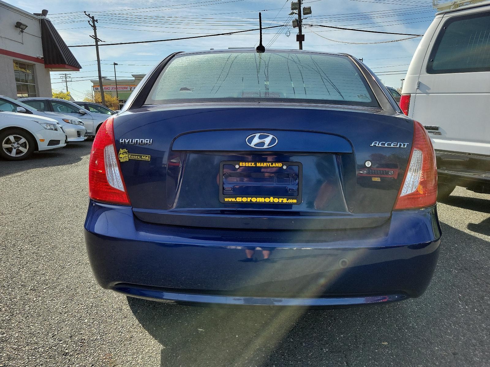 2011 Dark Sapphire Blue - 3E /Gray - FZ Hyundai Accent GLS (KMHCN4AC3BU) with an 1.6L DOHC MPI CVVT 16-valve I4 engine engine, located at 50 Eastern Blvd., Essex, MD, 21221, (410) 686-3444, 39.304367, -76.484947 - Step into sophistication and performance with our 2011 Hyundai Accent GLS 4dr Sedan Auto GLS. This top-tier ride is finished in an exquisite Dark Sapphire Blue - 3E exterior that is sure to turn heads. Slide into the comfortable Gray - FZ interior, where every detail has been designed with the drive - Photo #4