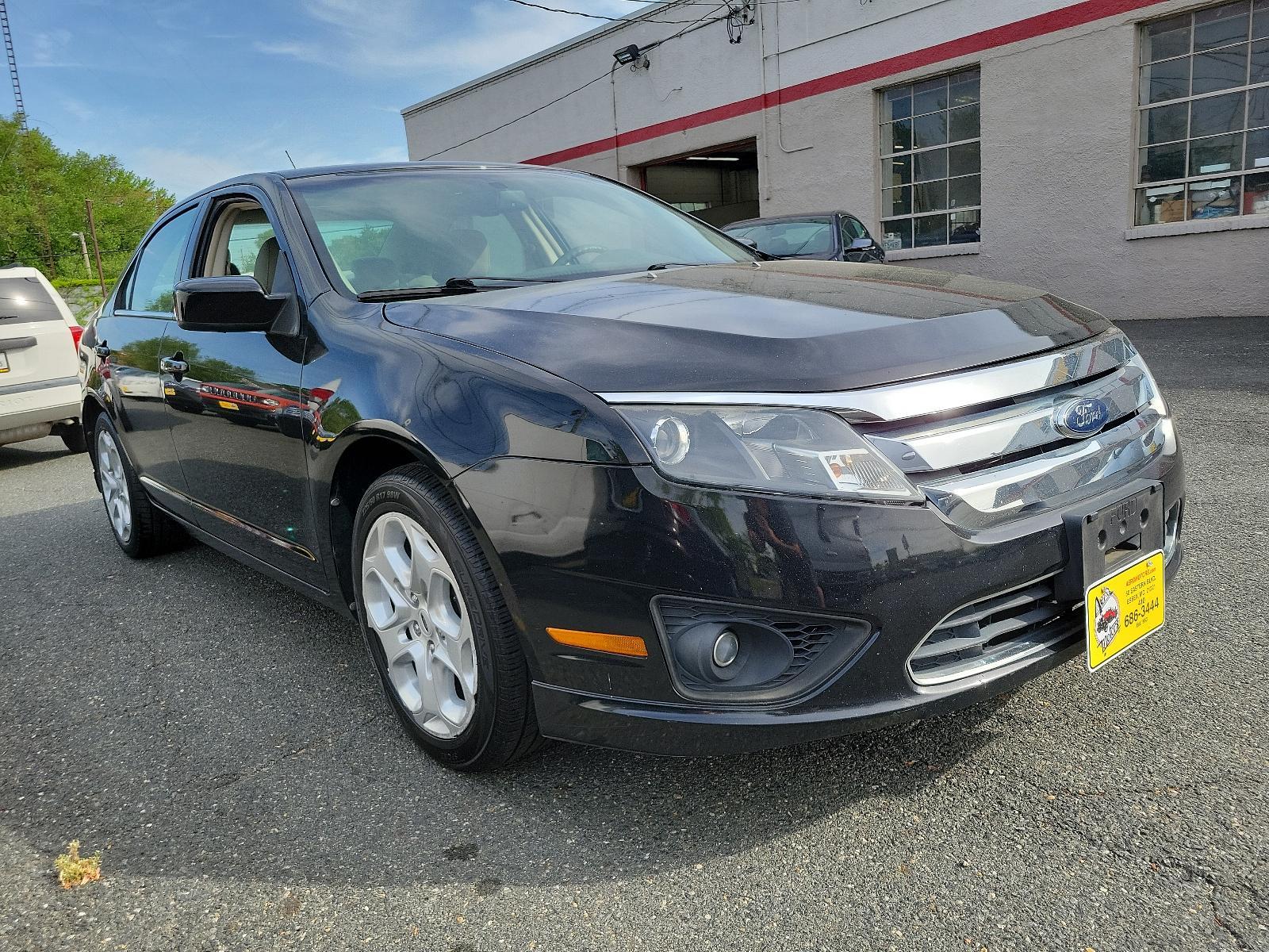 2010 Tuxedo Black Metallic - UH /Medium Light Stone - DL Ford Fusion SE (3FAHP0HG1AR) with an 3.0L 24V V6 DURATEC FLEX FUEL ENGINE engine, located at 50 Eastern Blvd., Essex, MD, 21221, (410) 686-3444, 39.304367, -76.484947 - Experience the perfect blend of style, comfort, and performance with this impeccable 2010 Ford Fusion SE Sedan. Showcased in sophisticated Tuxedo Black Metallic paintwork, this 4-door delight boasts a Medium Light Stone interior that promotes a sophisticated environment. Under the hood, you'll disco - Photo #2