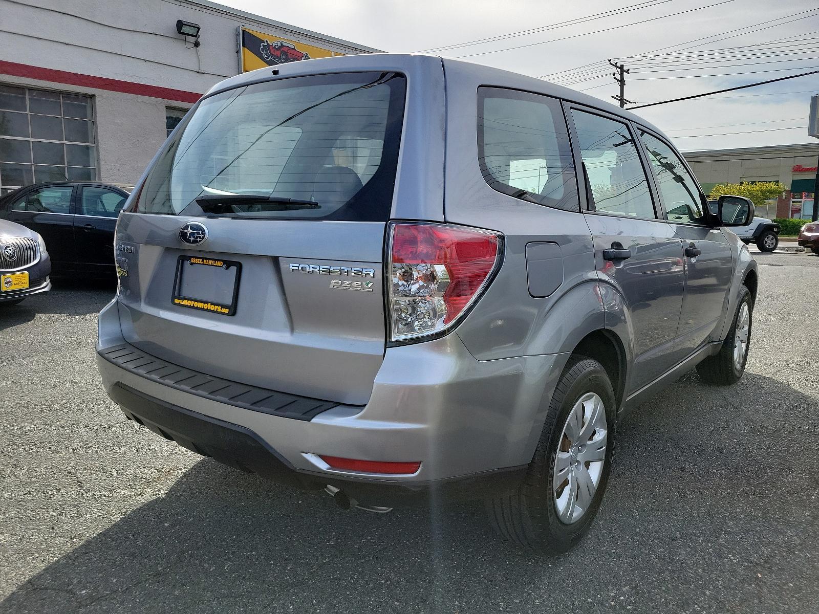 2010 Steel Silver Metallic - SSM /Aurora Platinum - APC Subaru Forester 2.5X (JF2SH6AC5AH) with an 2.5L SOHC SMPI 16-valve 4-cyl boxer engine engine, located at 50 Eastern Blvd., Essex, MD, 21221, (410) 686-3444, 39.304367, -76.484947 - Experience the impeccable blend of comfort, style, and performance in this 2010 Subaru Forester 2.5X. Encased in a striking Steel Silver Metallic exterior paired with an elegant Aurora Platinum interior, this SUV is a statement of sophistication. An ideal choice for the discerning driver, the 2.5l S - Photo #3