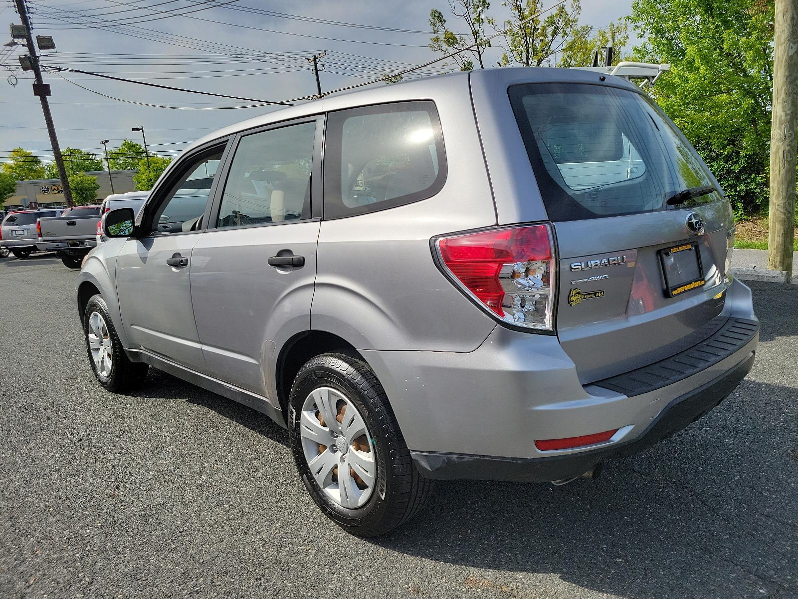 2010 Steel Silver Metallic - SSM /Aurora Platinum - APC Subaru Forester 2.5X (JF2SH6AC5AH) with an 2.5L SOHC SMPI 16-valve 4-cyl boxer engine engine, located at 50 Eastern Blvd., Essex, MD, 21221, (410) 686-3444, 39.304367, -76.484947 - Experience the impeccable blend of comfort, style, and performance in this 2010 Subaru Forester 2.5X. Encased in a striking Steel Silver Metallic exterior paired with an elegant Aurora Platinum interior, this SUV is a statement of sophistication. An ideal choice for the discerning driver, the 2.5l S - Photo #5