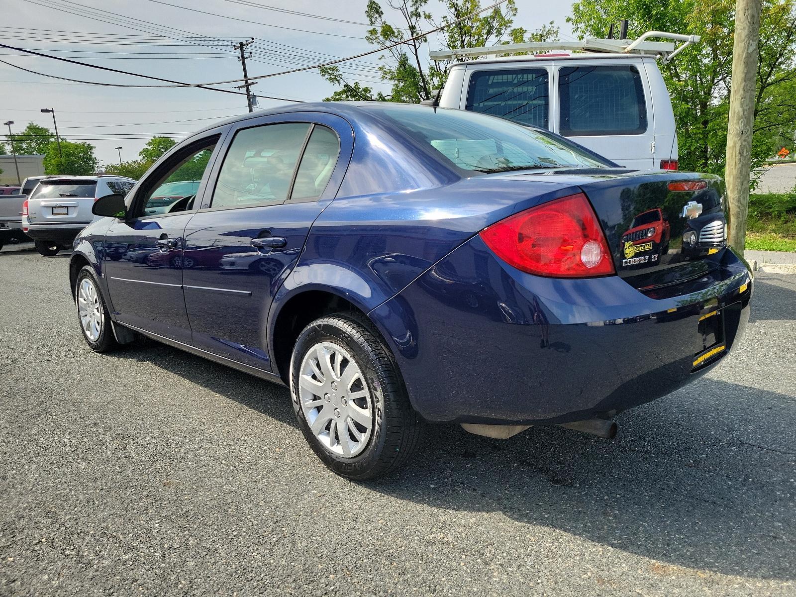 2009 Imperial Blue Metallic - 37U /Gray - 14C Chevrolet Cobalt LT w/1LT (1G1AT58H697) with an ENGINE, ECOTEC 2.2L CONTINUOUS VARIABLE VALVE TIMING DOHC 4-CYLINDER MFI engine, located at 50 Eastern Blvd., Essex, MD, 21221, (410) 686-3444, 39.304367, -76.484947 - Looking to experience exceptional driving comfort and reliability? Meet the 2009 Chevrolet Cobalt LT w/1LT 4dr sedan lt w/1LT, a perfect blend of power and practicality. The sharp look of its Imperial Blue Metallic - 37U exterior paired with the contemporary Gray - 14C interior provides an exquisite - Photo #5