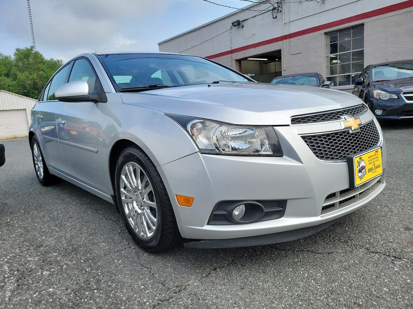 2014 Silver Ice Metallic - GAN /Jet Black - AFF Chevrolet Cruze ECO (1G1PH5SB6E7) with an ENGINE, ECOTEC TURBO 1.4L VARIABLE VALVE TIMING DOHC 4-CYLINDER SEQUENTIAL MFI engine, located at 50 Eastern Blvd., Essex, MD, 21221, (410) 686-3444, 39.304367, -76.484947 - Revel in the superior blend of performance and efficiency with this 2014 Chevrolet Cruze ECO 4dr Sedan. Cloaked in a captivating Silver Ice Metallic exterior, this elegant design is paired flawlessly with an immaculate Jet Black interior. Powered by a dynamic ECOTEC Turbo 1.4L Variable Valve Timing - Photo #2
