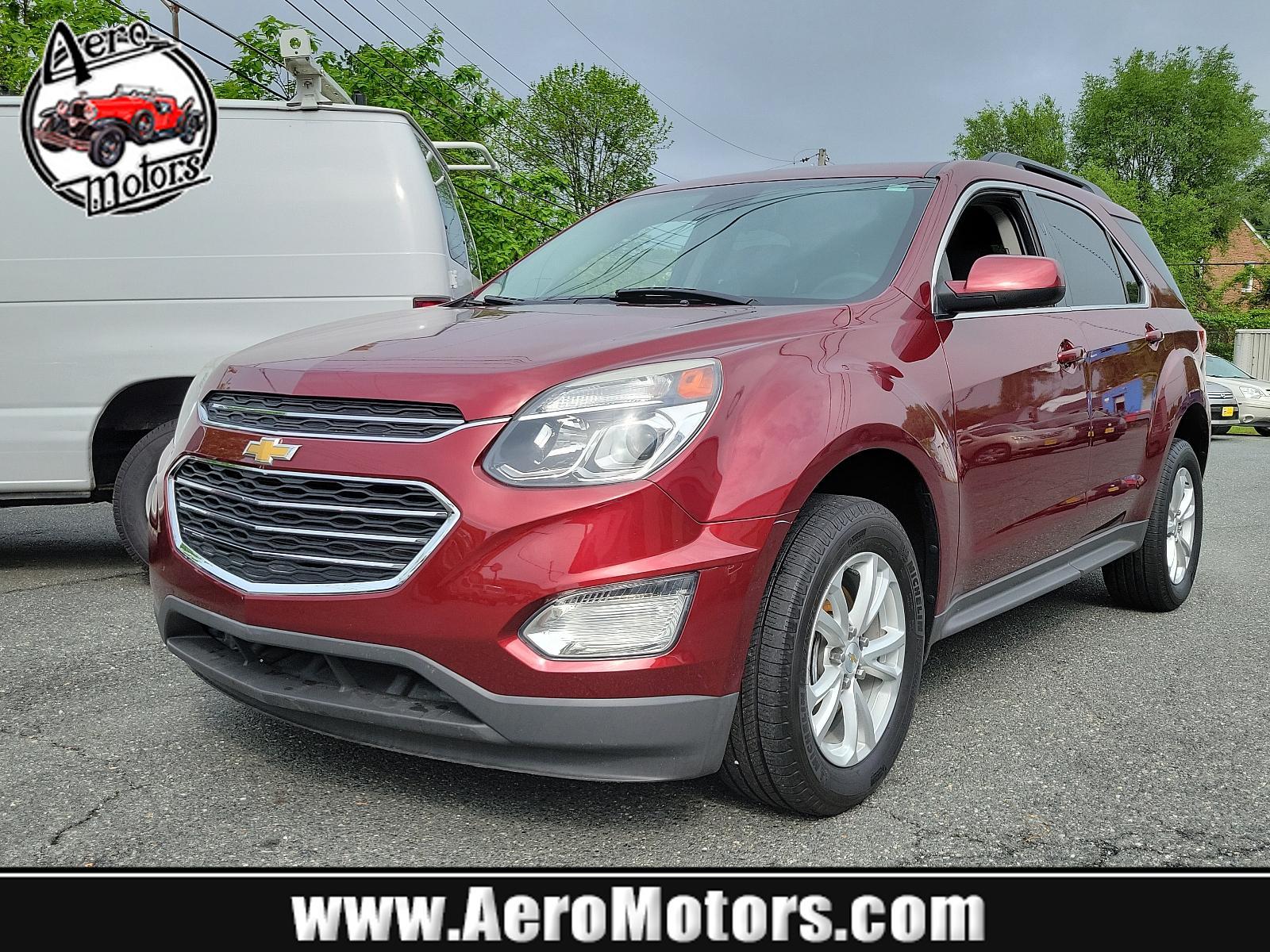 2016 Siren Red Tintcoat - G1E /Jet Black - AFJ Chevrolet Equinox LT (2GNFLFEK0G6) with an ENGINE, 2.4L DOHC 4-CYLINDER SIDI (SPARK IGNITION DIRECT INJECTION) engine, located at 50 Eastern Blvd., Essex, MD, 21221, (410) 686-3444, 39.304367, -76.484947 - Experience the symphony of power and comfort with our 2016 Chevrolet Equinox LT. Coated in a captivating Siren Red Tintcoat G1E exterior, this AWD 4dr LT assessment injects an aura of elegance and sportiness in your daily commute. Enter the cabin, and the luxurious Jet Black - AFJ interior will welc - Photo #0