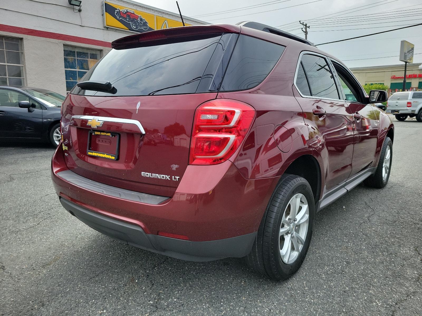 2016 Siren Red Tintcoat - G1E /Jet Black - AFJ Chevrolet Equinox LT (2GNFLFEK0G6) with an ENGINE, 2.4L DOHC 4-CYLINDER SIDI (SPARK IGNITION DIRECT INJECTION) engine, located at 50 Eastern Blvd., Essex, MD, 21221, (410) 686-3444, 39.304367, -76.484947 - Experience the symphony of power and comfort with our 2016 Chevrolet Equinox LT. Coated in a captivating Siren Red Tintcoat G1E exterior, this AWD 4dr LT assessment injects an aura of elegance and sportiness in your daily commute. Enter the cabin, and the luxurious Jet Black - AFJ interior will welc - Photo #3