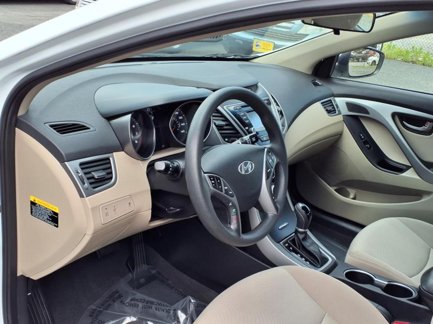 2015 Quartz White Pearl Hyundai ELANTRA SE (5NPDH4AEXFH) with an 1.8L 1.8L I4 145hp 130ft. lbs. Sequential-Port F.I. engine, 6-Speed Shiftable Automatic transmission, located at 50 Eastern Blvd., Essex, MD, 21221, (410) 686-3444, 39.304367, -76.484947 - Photo#9