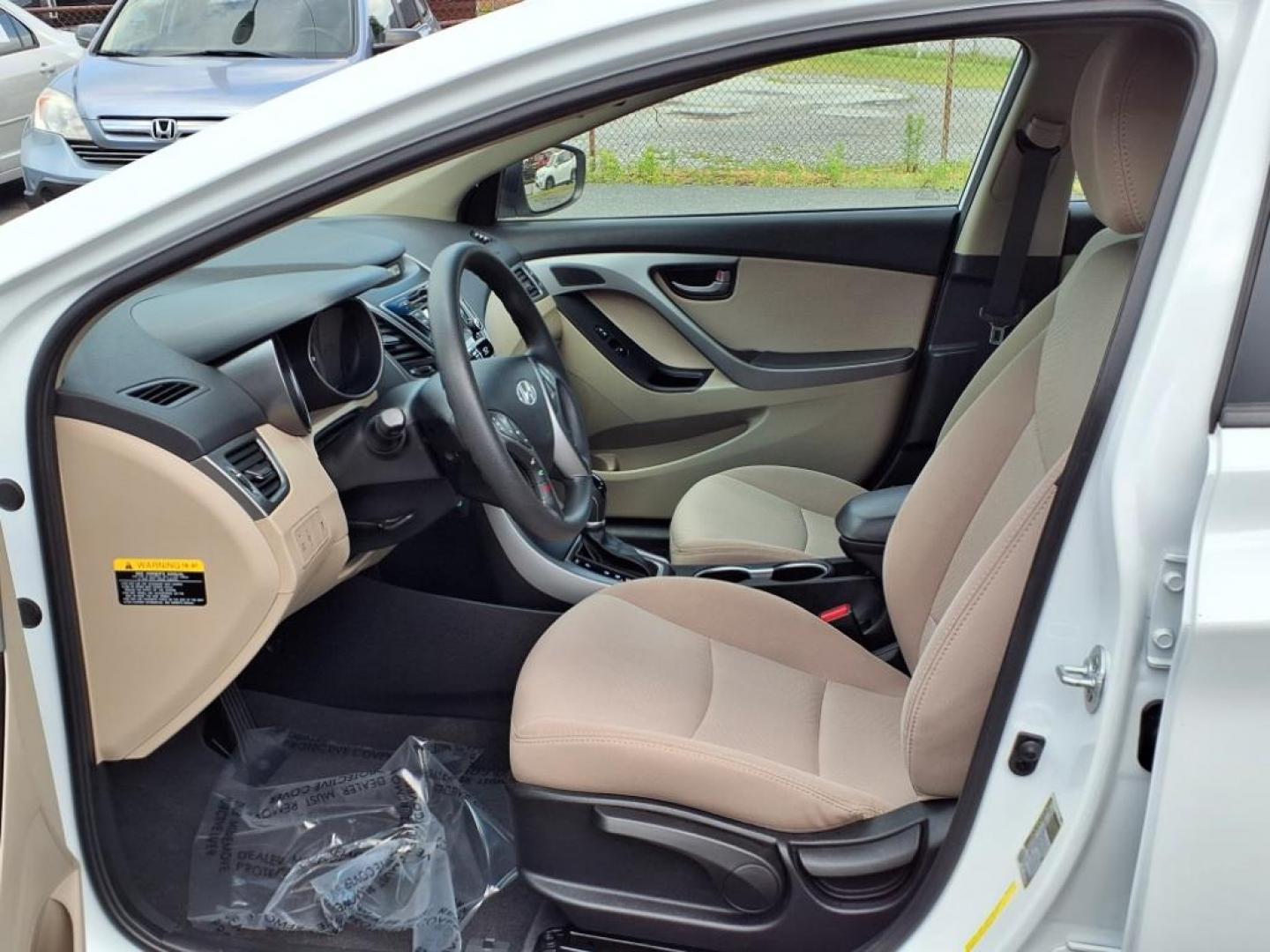 2015 Quartz White Pearl Hyundai ELANTRA SE (5NPDH4AEXFH) with an 1.8L 1.8L I4 145hp 130ft. lbs. Sequential-Port F.I. engine, 6-Speed Shiftable Automatic transmission, located at 50 Eastern Blvd., Essex, MD, 21221, (410) 686-3444, 39.304367, -76.484947 - Photo#10