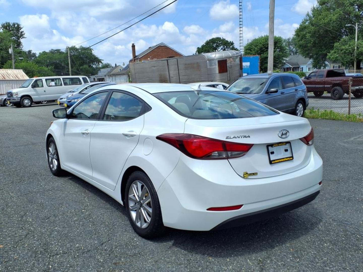 2015 Quartz White Pearl Hyundai ELANTRA SE (5NPDH4AEXFH) with an 1.8L 1.8L I4 145hp 130ft. lbs. Sequential-Port F.I. engine, 6-Speed Shiftable Automatic transmission, located at 50 Eastern Blvd., Essex, MD, 21221, (410) 686-3444, 39.304367, -76.484947 - Photo#2