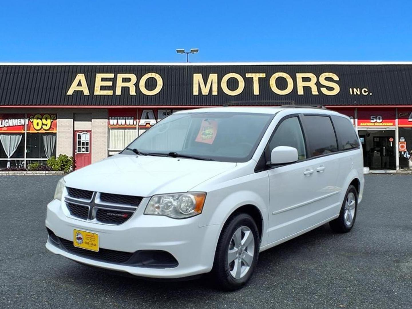 2014 Bright White Clear Coat Dodge Grand Caravan SXT (2C4RDGCG3ER) with an 3.6L Pentastar 3.6L Flex Fuel V6 283hp 260ft. lbs. Sequential-Port F.I. engine, 6-Speed Shiftable Automatic transmission, located at 50 Eastern Blvd., Essex, MD, 21221, (410) 686-3444, 39.304367, -76.484947 - Photo#0