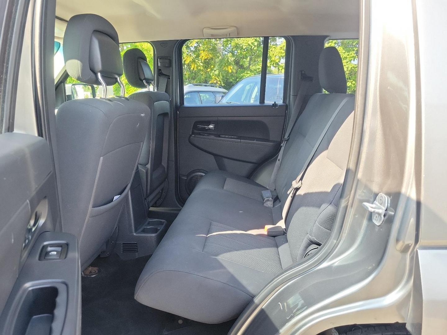 2012 Mineral Gray Metallic - PDM /Dark Slate Gray Interior - ALDV Jeep Liberty Sport (1C4PJMAK1CW) with an 3.7L V6 ENGINE engine, located at 50 Eastern Blvd., Essex, MD, 21221, (410) 686-3444, 39.304367, -76.484947 - Experience the perfect mesh of off-road capability and classic design with this 2012 Jeep Liberty Sport 4WD. Its stunning Mineral Gray Metallic exterior perfectly complements the rich, Dark Slate Gray interior, creating an air of modern sophistication. Under the hood, this beauty is equipped with a - Photo#9