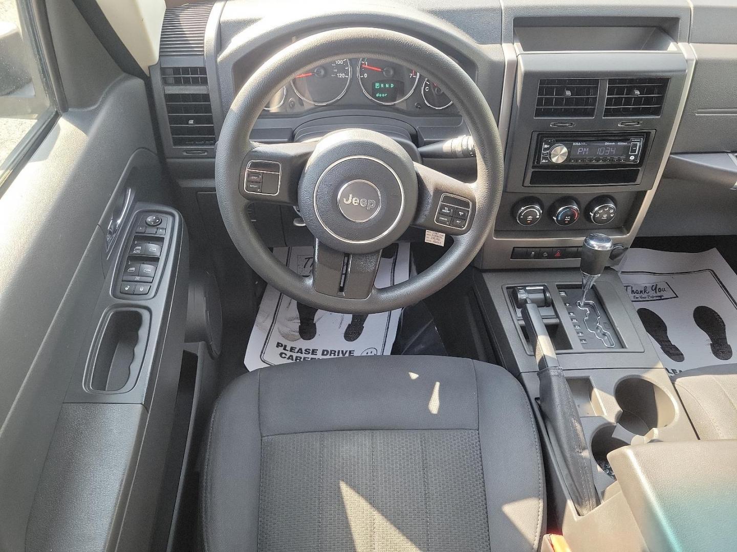 2012 Mineral Gray Metallic - PDM /Dark Slate Gray Interior - ALDV Jeep Liberty Sport (1C4PJMAK1CW) with an 3.7L V6 ENGINE engine, located at 50 Eastern Blvd., Essex, MD, 21221, (410) 686-3444, 39.304367, -76.484947 - Experience the perfect mesh of off-road capability and classic design with this 2012 Jeep Liberty Sport 4WD. Its stunning Mineral Gray Metallic exterior perfectly complements the rich, Dark Slate Gray interior, creating an air of modern sophistication. Under the hood, this beauty is equipped with a - Photo#10