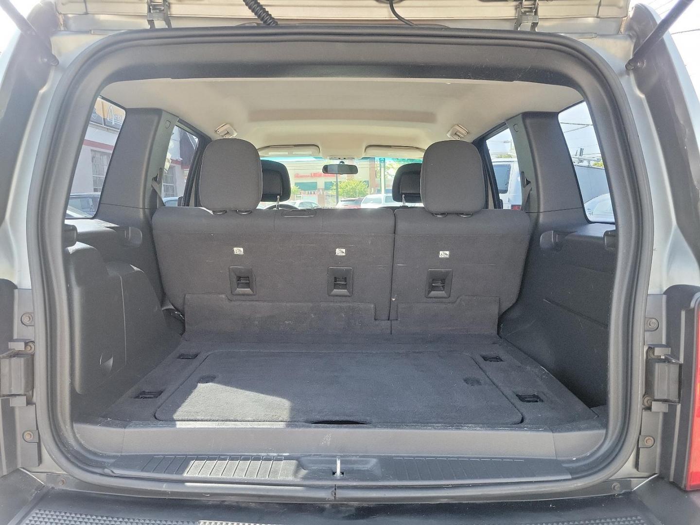 2012 Mineral Gray Metallic - PDM /Dark Slate Gray Interior - ALDV Jeep Liberty Sport (1C4PJMAK1CW) with an 3.7L V6 ENGINE engine, located at 50 Eastern Blvd., Essex, MD, 21221, (410) 686-3444, 39.304367, -76.484947 - Experience the perfect mesh of off-road capability and classic design with this 2012 Jeep Liberty Sport 4WD. Its stunning Mineral Gray Metallic exterior perfectly complements the rich, Dark Slate Gray interior, creating an air of modern sophistication. Under the hood, this beauty is equipped with a - Photo#24