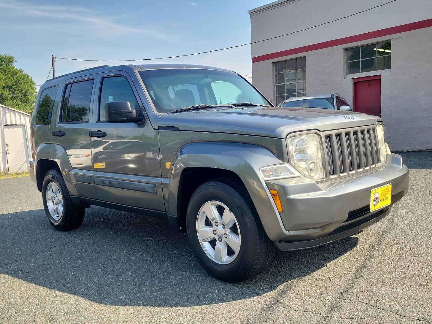 2012 Mineral Gray Metallic - PDM /Dark Slate Gray Interior - ALDV Jeep Liberty Sport (1C4PJMAK1CW) with an 3.7L V6 ENGINE engine, located at 50 Eastern Blvd., Essex, MD, 21221, (410) 686-3444, 39.304367, -76.484947 - Experience the perfect mesh of off-road capability and classic design with this 2012 Jeep Liberty Sport 4WD. Its stunning Mineral Gray Metallic exterior perfectly complements the rich, Dark Slate Gray interior, creating an air of modern sophistication. Under the hood, this beauty is equipped with a - Photo#2