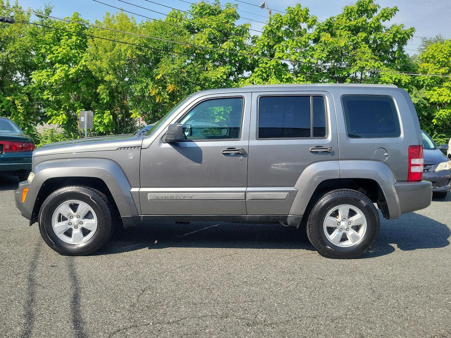 2012 Mineral Gray Metallic - PDM /Dark Slate Gray Interior - ALDV Jeep Liberty Sport (1C4PJMAK1CW) with an 3.7L V6 ENGINE engine, located at 50 Eastern Blvd., Essex, MD, 21221, (410) 686-3444, 39.304367, -76.484947 - Experience the perfect mesh of off-road capability and classic design with this 2012 Jeep Liberty Sport 4WD. Its stunning Mineral Gray Metallic exterior perfectly complements the rich, Dark Slate Gray interior, creating an air of modern sophistication. Under the hood, this beauty is equipped with a - Photo#6