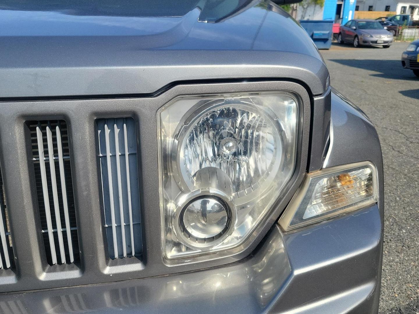 2012 Mineral Gray Metallic - PDM /Dark Slate Gray Interior - ALDV Jeep Liberty Sport (1C4PJMAK1CW) with an 3.7L V6 ENGINE engine, located at 50 Eastern Blvd., Essex, MD, 21221, (410) 686-3444, 39.304367, -76.484947 - Experience the perfect mesh of off-road capability and classic design with this 2012 Jeep Liberty Sport 4WD. Its stunning Mineral Gray Metallic exterior perfectly complements the rich, Dark Slate Gray interior, creating an air of modern sophistication. Under the hood, this beauty is equipped with a - Photo#8