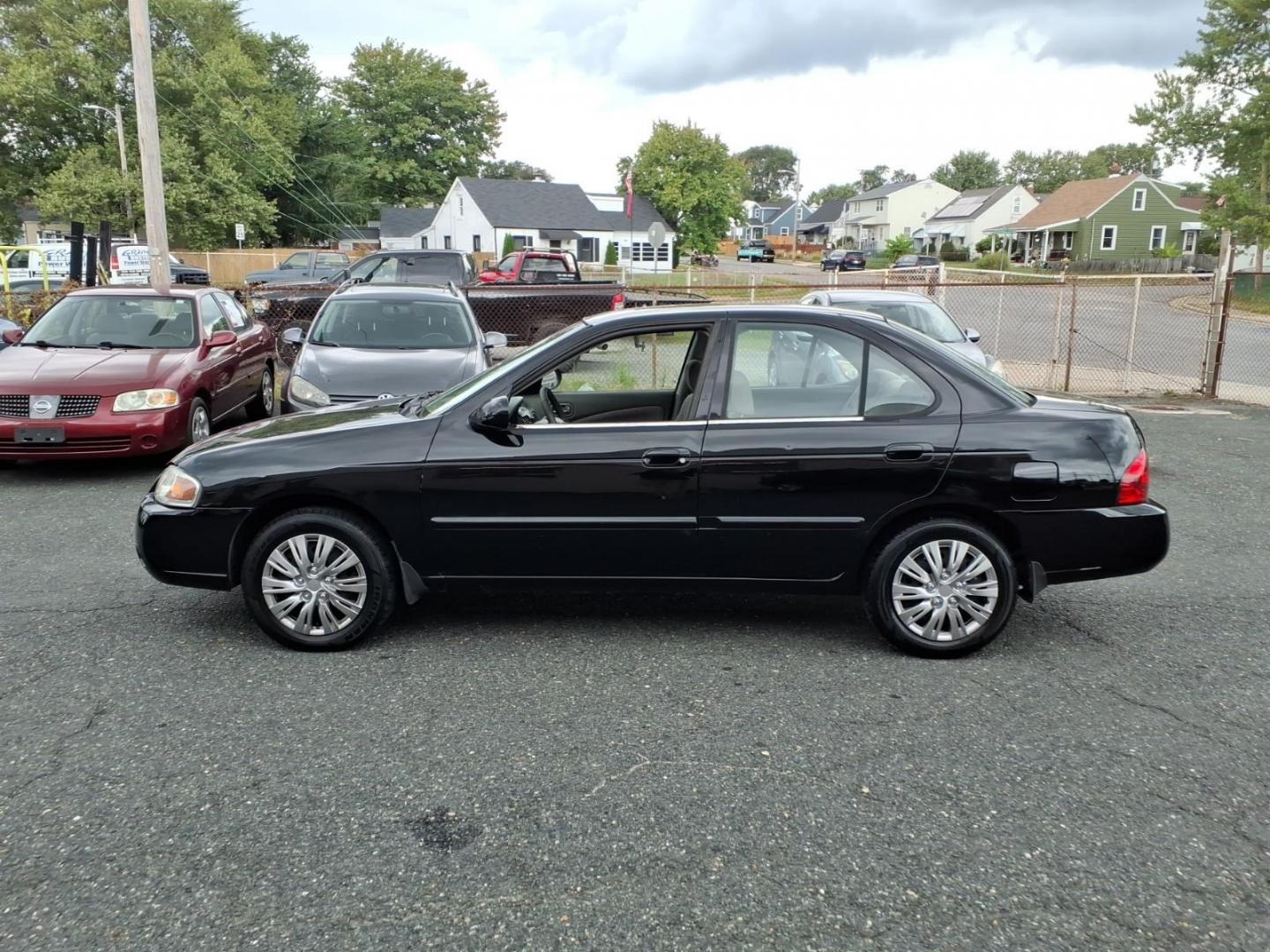 2004 Blackout Nissan Sentra 1.8 S (3N1CB51D54L) with an 1.8L 1L NA I4 double overhead cam (DOHC) 16V Fuel Injected engine, Automatic transmission, located at 50 Eastern Blvd., Essex, MD, 21221, (410) 686-3444, 39.304367, -76.484947- Photo#1