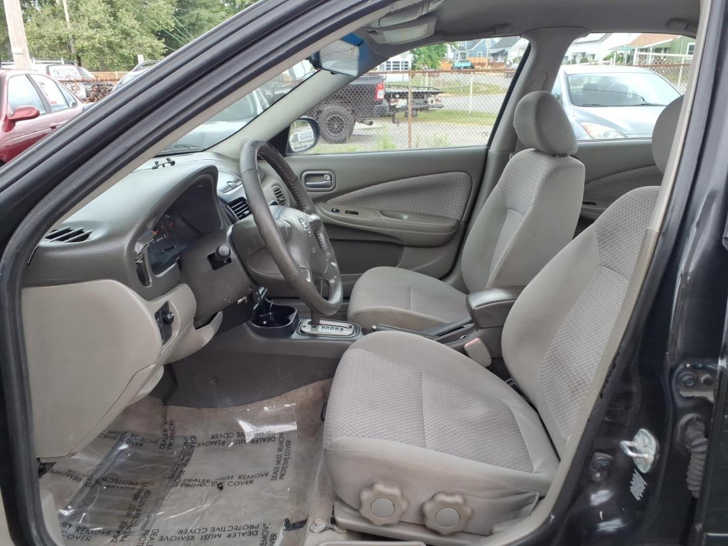 2004 Blackout Nissan Sentra 1.8 S (3N1CB51D54L) with an 1.8L 1L NA I4 double overhead cam (DOHC) 16V Fuel Injected engine, Automatic transmission, located at 50 Eastern Blvd., Essex, MD, 21221, (410) 686-3444, 39.304367, -76.484947- Photo#3