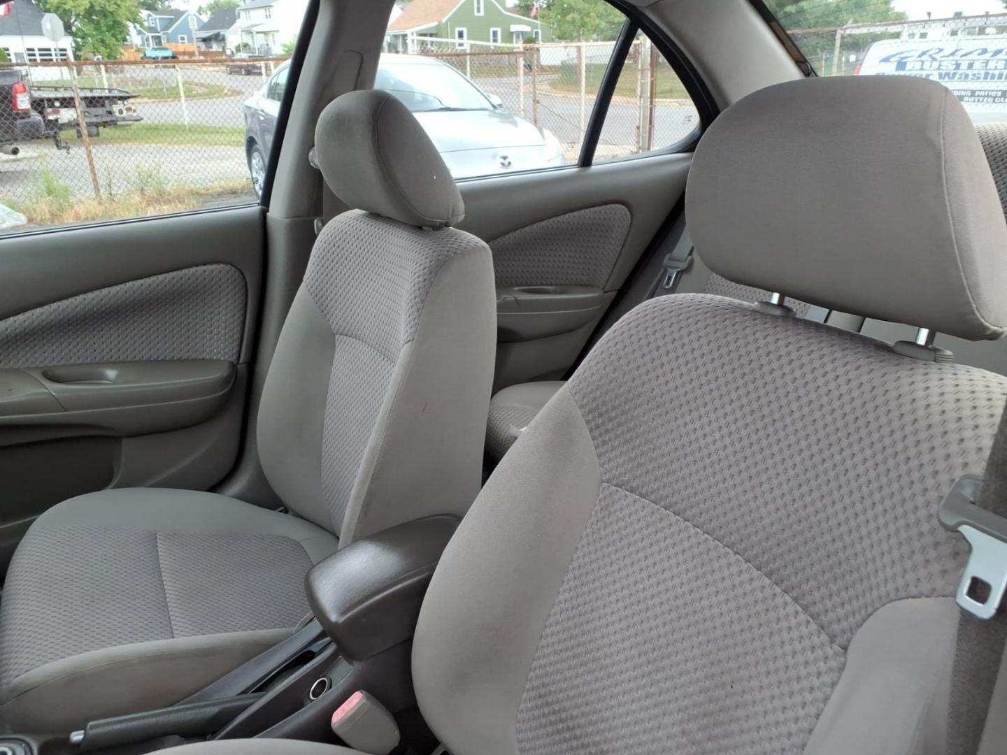 2004 Blackout Nissan Sentra 1.8 S (3N1CB51D54L) with an 1.8L 1L NA I4 double overhead cam (DOHC) 16V Fuel Injected engine, Automatic transmission, located at 50 Eastern Blvd., Essex, MD, 21221, (410) 686-3444, 39.304367, -76.484947- Photo#5