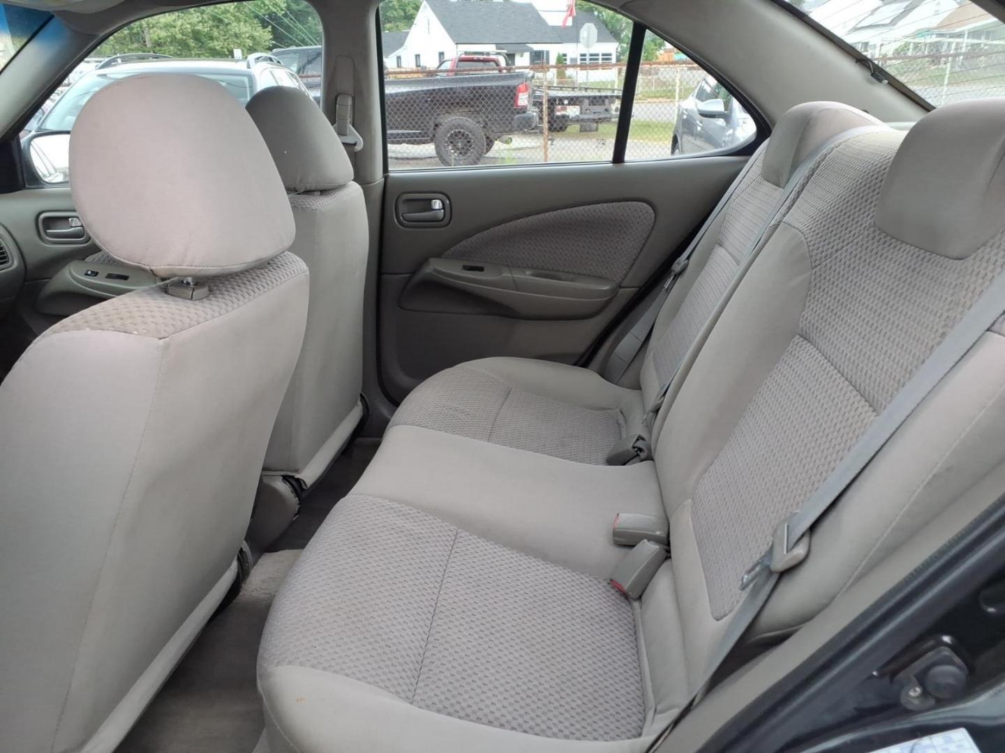 2004 Blackout Nissan Sentra 1.8 S (3N1CB51D54L) with an 1.8L 1L NA I4 double overhead cam (DOHC) 16V Fuel Injected engine, Automatic transmission, located at 50 Eastern Blvd., Essex, MD, 21221, (410) 686-3444, 39.304367, -76.484947- Photo#8