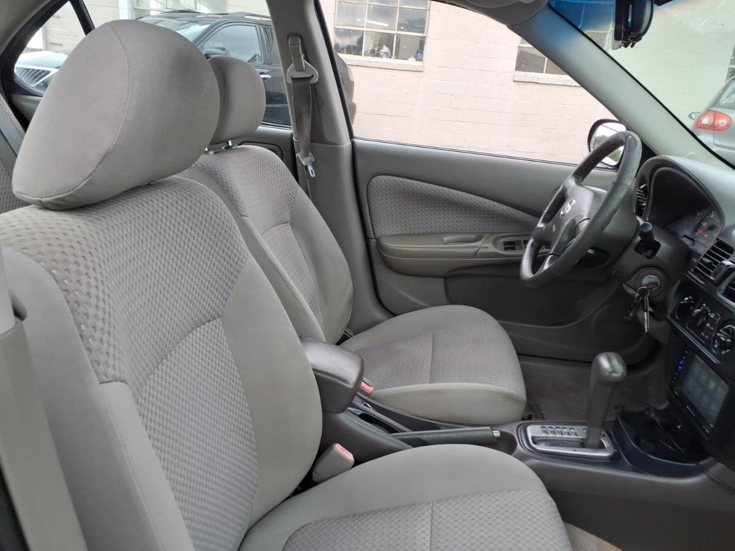2004 Blackout Nissan Sentra 1.8 S (3N1CB51D54L) with an 1.8L 1L NA I4 double overhead cam (DOHC) 16V Fuel Injected engine, Automatic transmission, located at 50 Eastern Blvd., Essex, MD, 21221, (410) 686-3444, 39.304367, -76.484947- Photo#9
