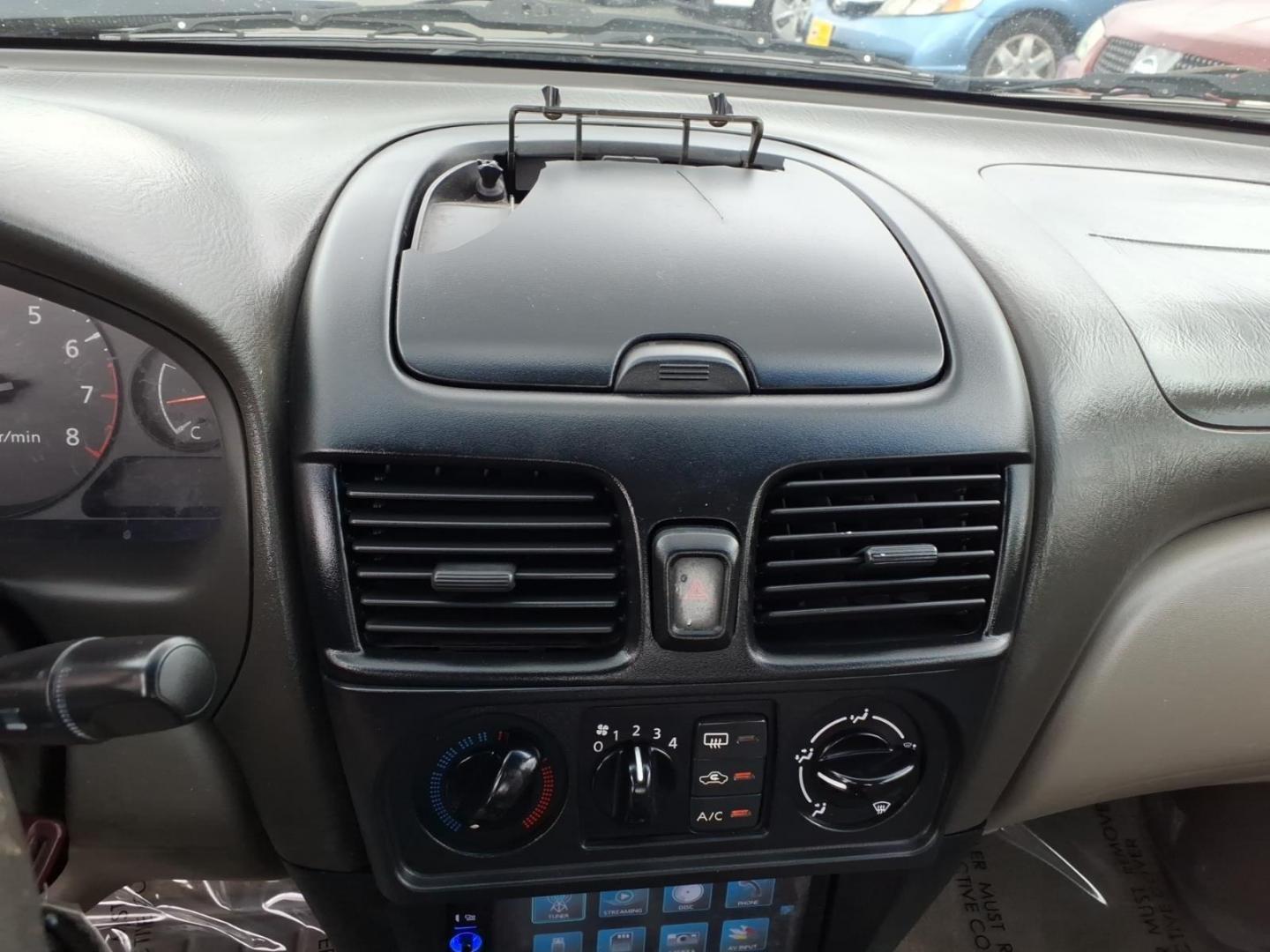 2004 Blackout Nissan Sentra 1.8 S (3N1CB51D54L) with an 1.8L 1L NA I4 double overhead cam (DOHC) 16V Fuel Injected engine, Automatic transmission, located at 50 Eastern Blvd., Essex, MD, 21221, (410) 686-3444, 39.304367, -76.484947- Photo#11
