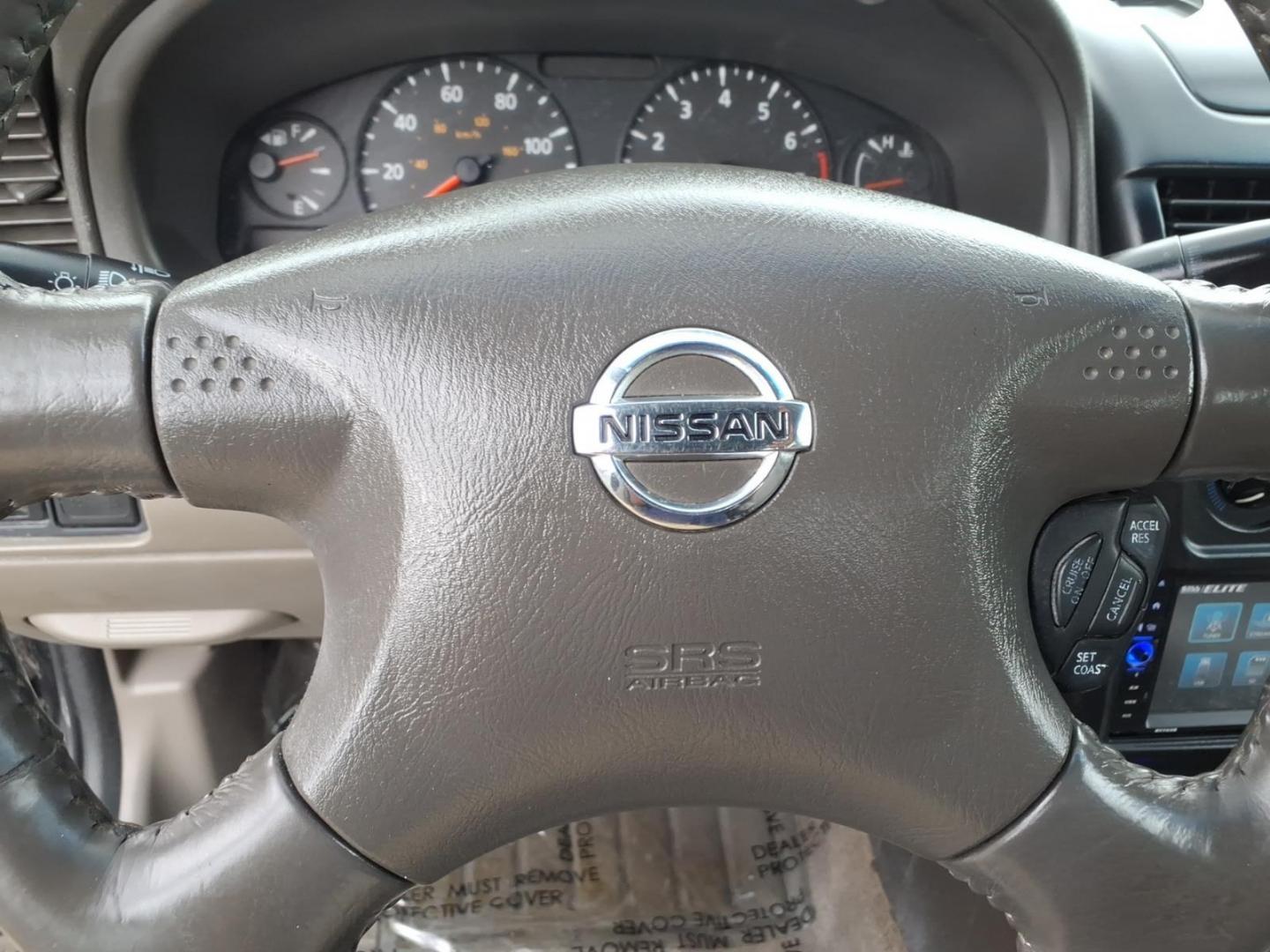 2004 Blackout Nissan Sentra 1.8 S (3N1CB51D54L) with an 1.8L 1L NA I4 double overhead cam (DOHC) 16V Fuel Injected engine, Automatic transmission, located at 50 Eastern Blvd., Essex, MD, 21221, (410) 686-3444, 39.304367, -76.484947- Photo#14