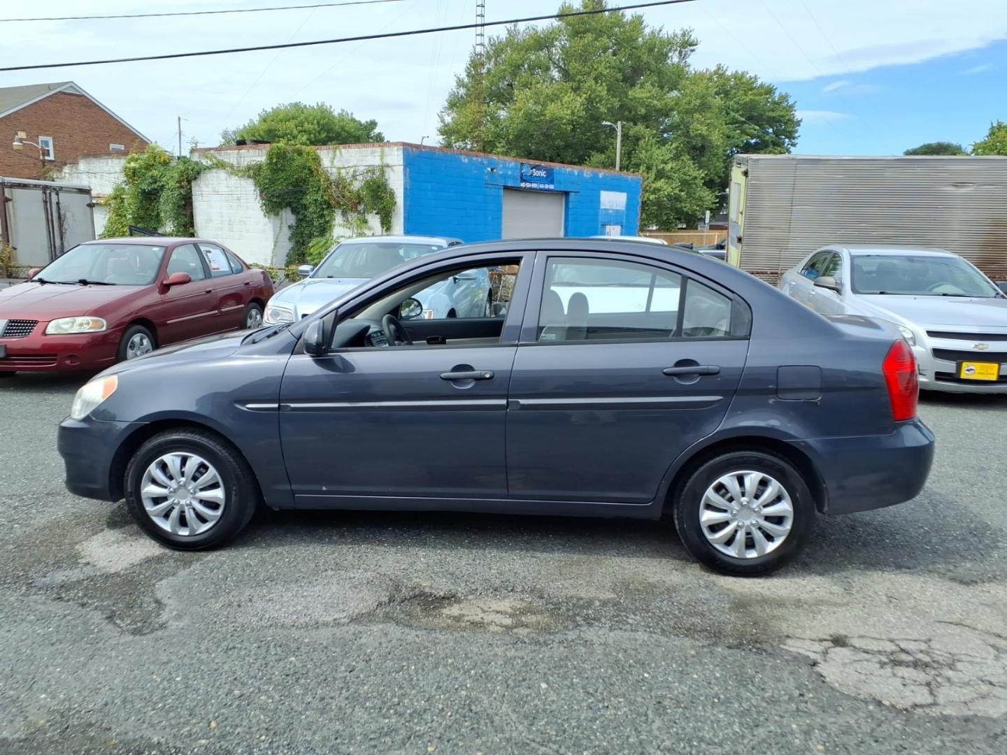 2009 Dk. Gray Hyundai ACCENT GLS (KMHCN46C59U) with an 1.6L 4 Cylinder Sequential-Port F.I. engine, Automatic transmission, located at 50 Eastern Blvd., Essex, MD, 21221, (410) 686-3444, 39.304367, -76.484947- Photo#1