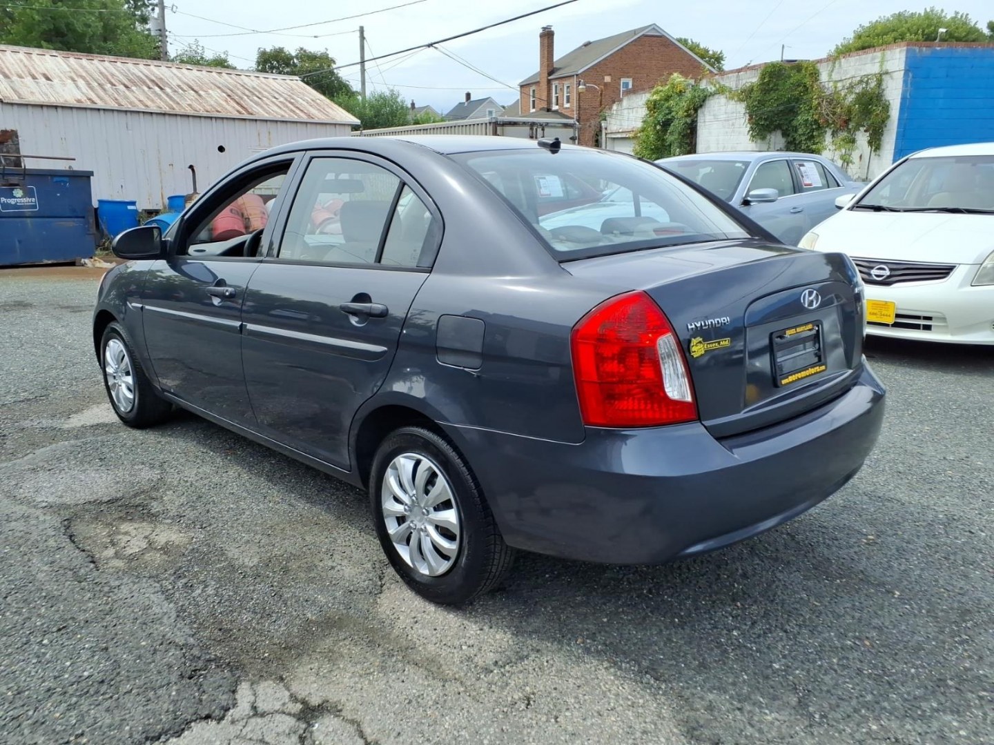 2009 Dk. Gray Hyundai ACCENT GLS (KMHCN46C59U) with an 1.6L 4 Cylinder Sequential-Port F.I. engine, Automatic transmission, located at 50 Eastern Blvd., Essex, MD, 21221, (410) 686-3444, 39.304367, -76.484947- Photo#2