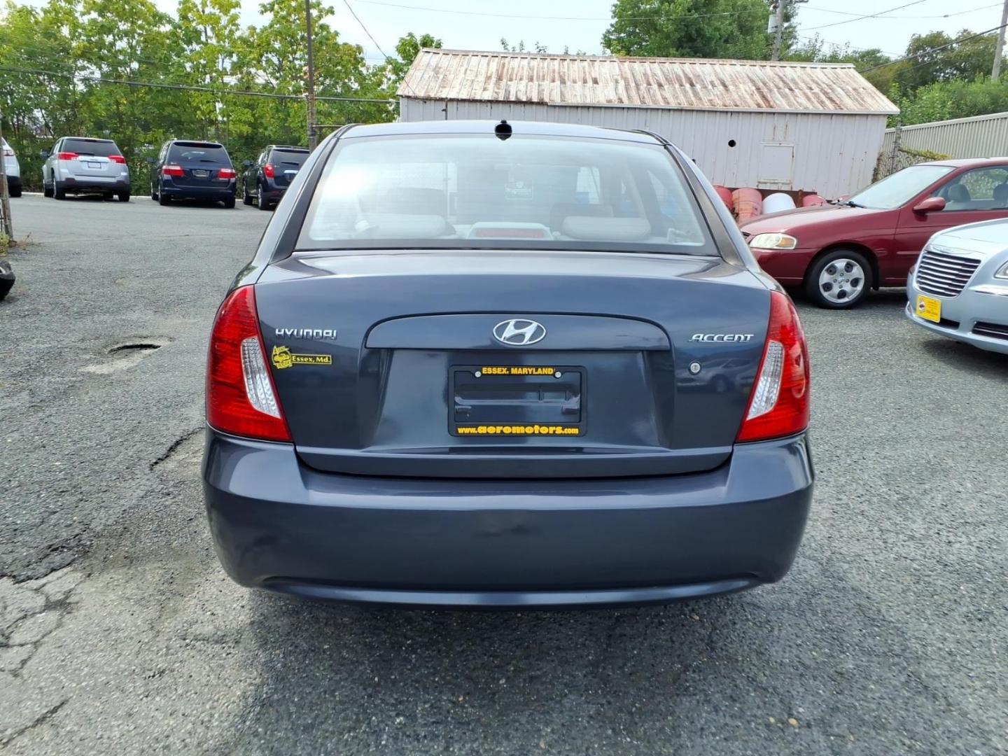 2009 Dk. Gray Hyundai ACCENT GLS (KMHCN46C59U) with an 1.6L 4 Cylinder Sequential-Port F.I. engine, Automatic transmission, located at 50 Eastern Blvd., Essex, MD, 21221, (410) 686-3444, 39.304367, -76.484947- Photo#3