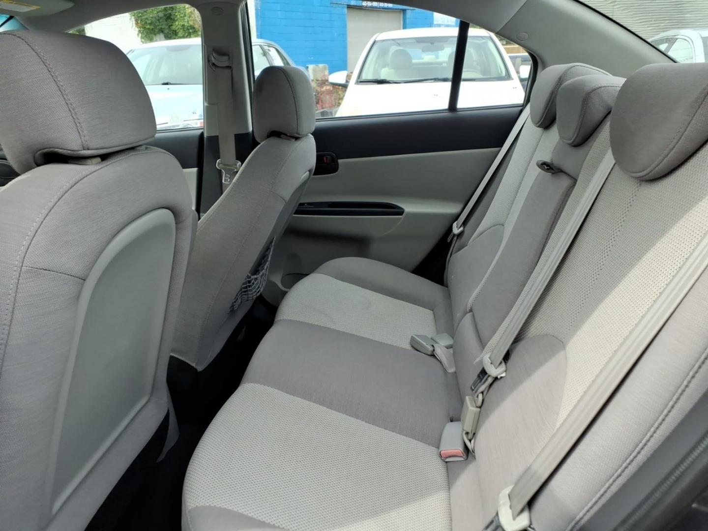 2009 Dk. Gray Hyundai ACCENT GLS (KMHCN46C59U) with an 1.6L 4 Cylinder Sequential-Port F.I. engine, Automatic transmission, located at 50 Eastern Blvd., Essex, MD, 21221, (410) 686-3444, 39.304367, -76.484947- Photo#10