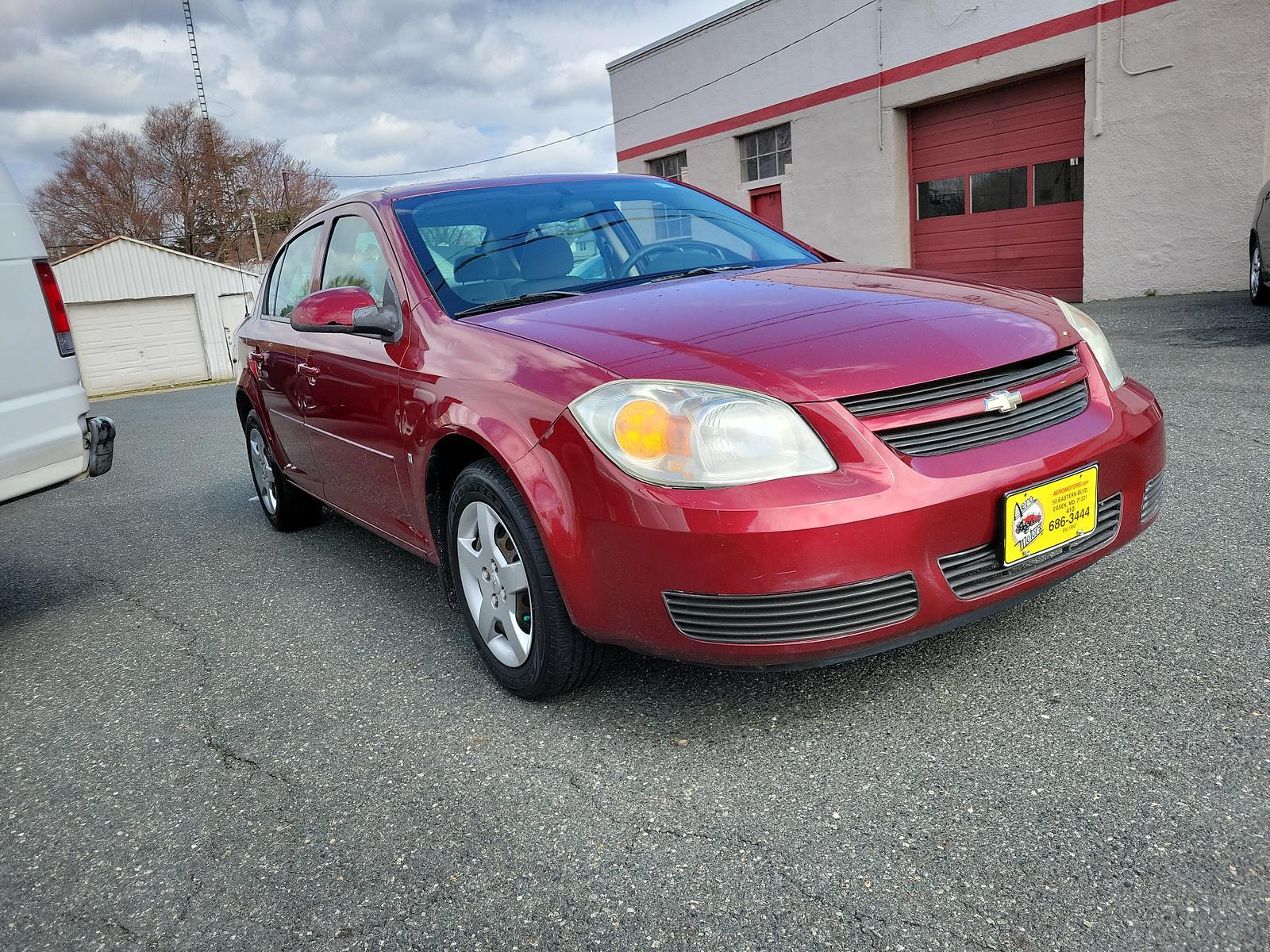 2007 Sport Red Tint Coat - 29U /Gray - 14 Chevrolet Cobalt LT (1G1AL55F277) with an ENGINE, ECOTEC 2.2L DOHC 16-VALVE 4-CYLINDER SFI engine, located at 50 Eastern Blvd., Essex, MD, 21221, (410) 686-3444, 39.304367, -76.484947 - <p>Meet our great looking 2007 Chevrolet Cobalt LT Sedan shown in Sport Red Tintcoat. Powered by a peppy 2.2 Liter 4 Cylinder that produces 148hp at your command while paired with a 4 Speed Automatic transmission. Our Front Wheel Drive will deliver up to 32mpg on the open road. </p><p><br></p><p>Our - Photo #2