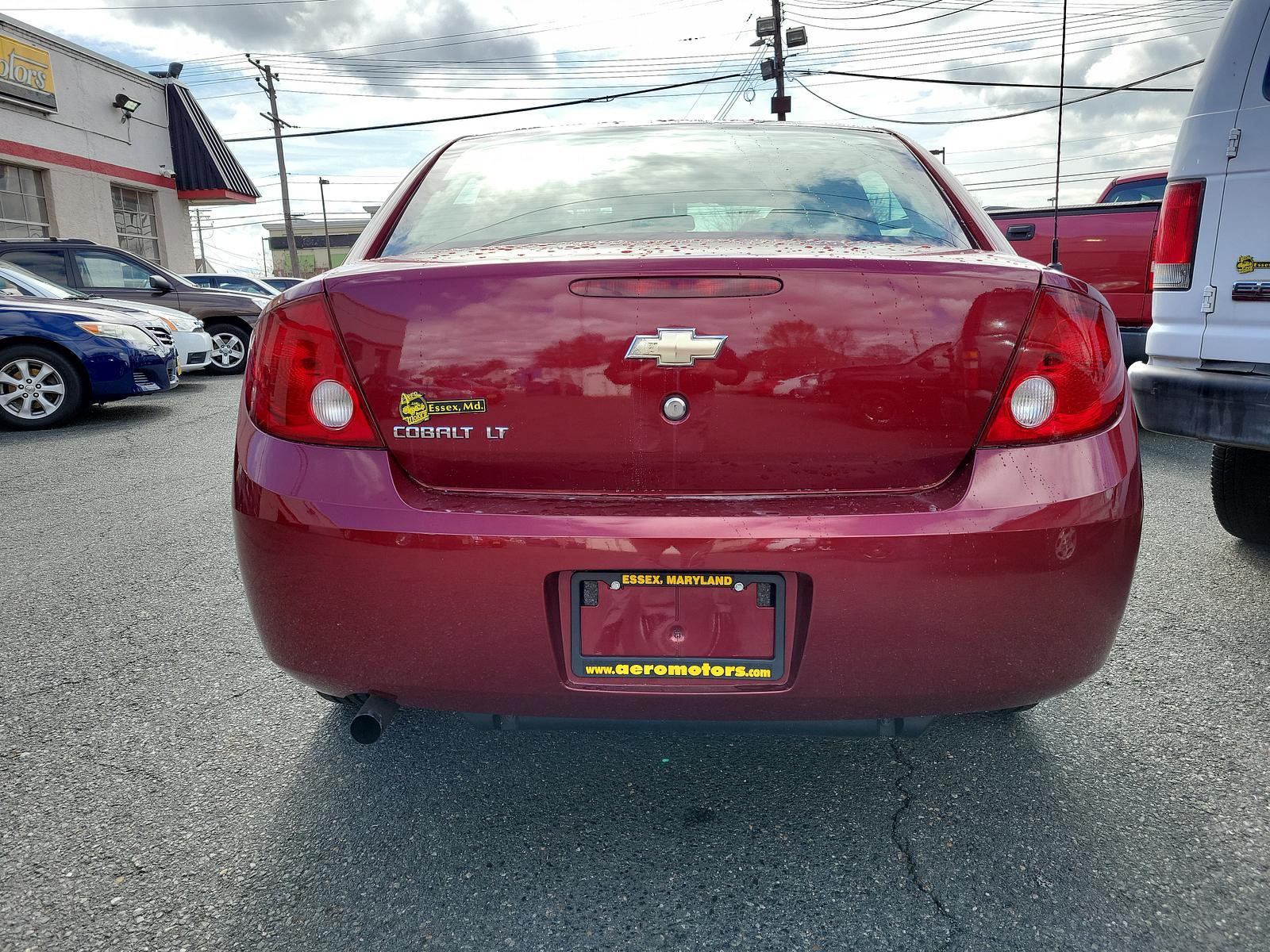 2007 Sport Red Tint Coat - 29U /Gray - 14 Chevrolet Cobalt LT (1G1AL55F277) with an ENGINE, ECOTEC 2.2L DOHC 16-VALVE 4-CYLINDER SFI engine, located at 50 Eastern Blvd., Essex, MD, 21221, (410) 686-3444, 39.304367, -76.484947 - <p>Meet our great looking 2007 Chevrolet Cobalt LT Sedan shown in Sport Red Tintcoat. Powered by a peppy 2.2 Liter 4 Cylinder that produces 148hp at your command while paired with a 4 Speed Automatic transmission. Our Front Wheel Drive will deliver up to 32mpg on the open road. </p><p><br></p><p>Our - Photo #4