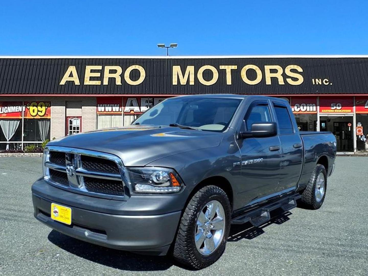 2011 Mineral Gray Metallic Clear Coat RAM 1500 Sport (1D7RV1GTXBS) with an 5.7L HEMI 5.7L V8 390hp 407ft. lbs. Sequential-Port F.I. engine, 5-Speed Automatic transmission, located at 50 Eastern Blvd., Essex, MD, 21221, (410) 686-3444, 39.304367, -76.484947 - Photo#0