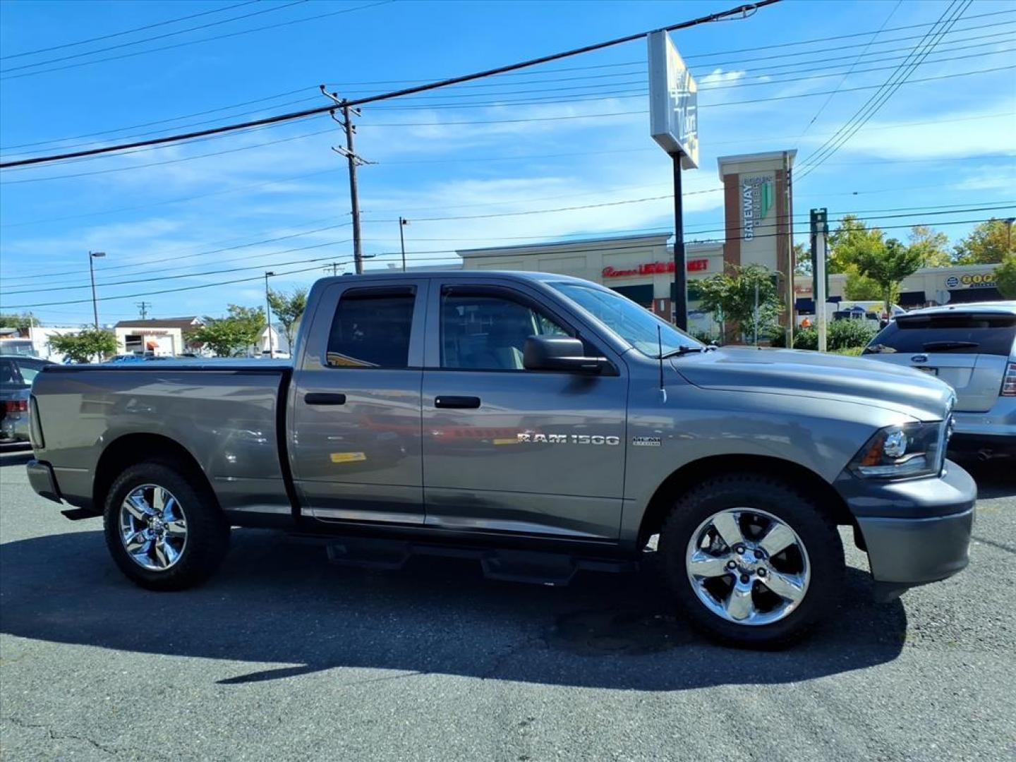 2011 Mineral Gray Metallic Clear Coat RAM 1500 Sport (1D7RV1GTXBS) with an 5.7L HEMI 5.7L V8 390hp 407ft. lbs. Sequential-Port F.I. engine, 5-Speed Automatic transmission, located at 50 Eastern Blvd., Essex, MD, 21221, (410) 686-3444, 39.304367, -76.484947 - Photo#5