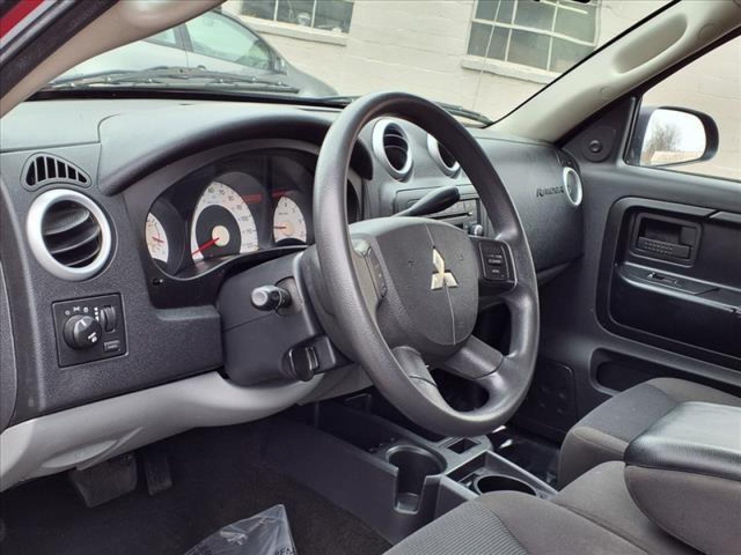2008 Lava Red Mitsubishi Raider LS (1Z7HC22K38S) with an 3.7L 3.7L V6 210hp 235ft. lbs. Fuel Injected engine, 4-Speed Automatic transmission, located at 50 Eastern Blvd., Essex, MD, 21221, (410) 686-3444, 39.304367, -76.484947 - Photo#10