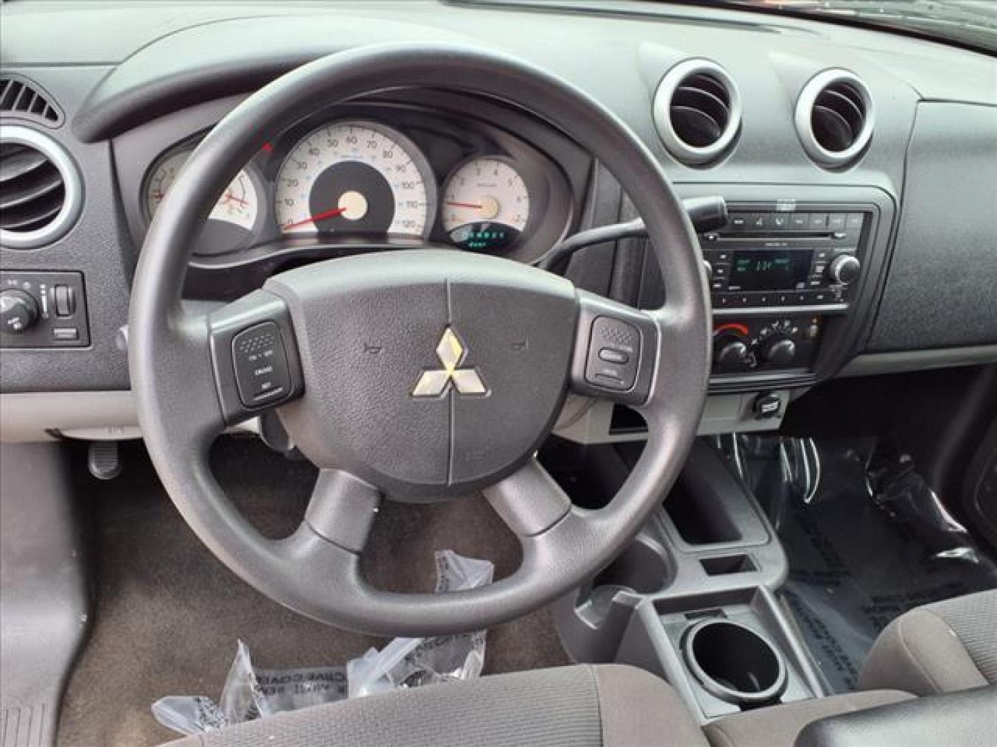2008 Lava Red Mitsubishi Raider LS (1Z7HC22K38S) with an 3.7L 3.7L V6 210hp 235ft. lbs. Fuel Injected engine, 4-Speed Automatic transmission, located at 50 Eastern Blvd., Essex, MD, 21221, (410) 686-3444, 39.304367, -76.484947 - Photo#13
