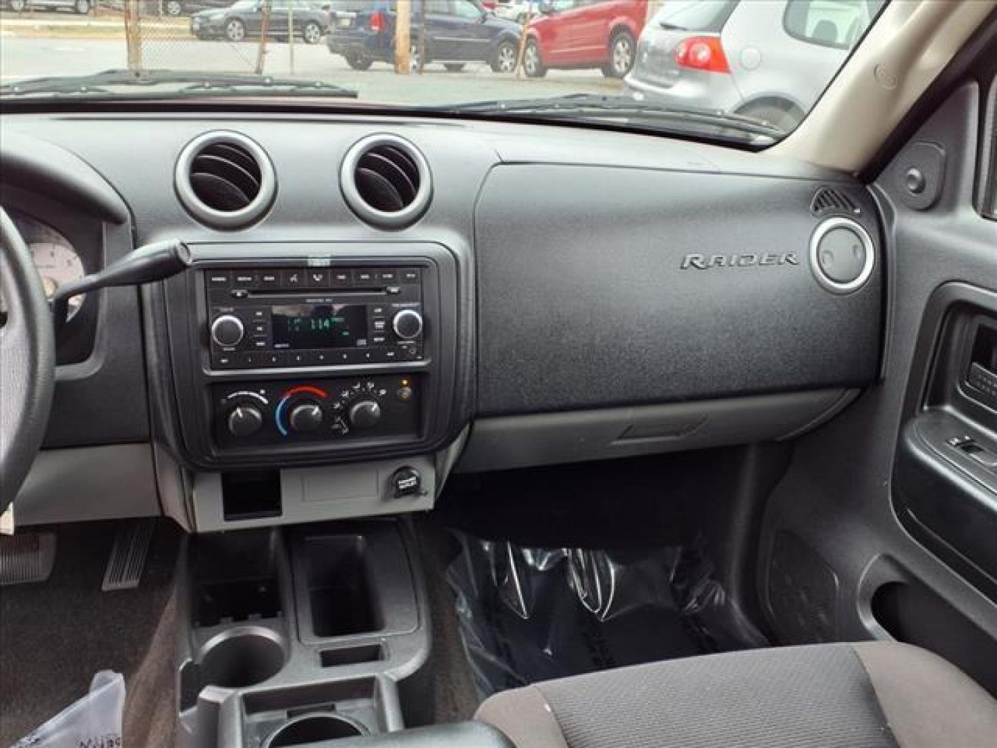 2008 Lava Red Mitsubishi Raider LS (1Z7HC22K38S) with an 3.7L 3.7L V6 210hp 235ft. lbs. Fuel Injected engine, 4-Speed Automatic transmission, located at 50 Eastern Blvd., Essex, MD, 21221, (410) 686-3444, 39.304367, -76.484947 - Photo#15