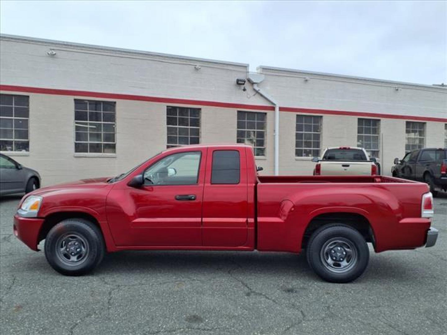 2008 Lava Red Mitsubishi Raider LS (1Z7HC22K38S) with an 3.7L 3.7L V6 210hp 235ft. lbs. Fuel Injected engine, 4-Speed Automatic transmission, located at 50 Eastern Blvd., Essex, MD, 21221, (410) 686-3444, 39.304367, -76.484947 - Photo#1