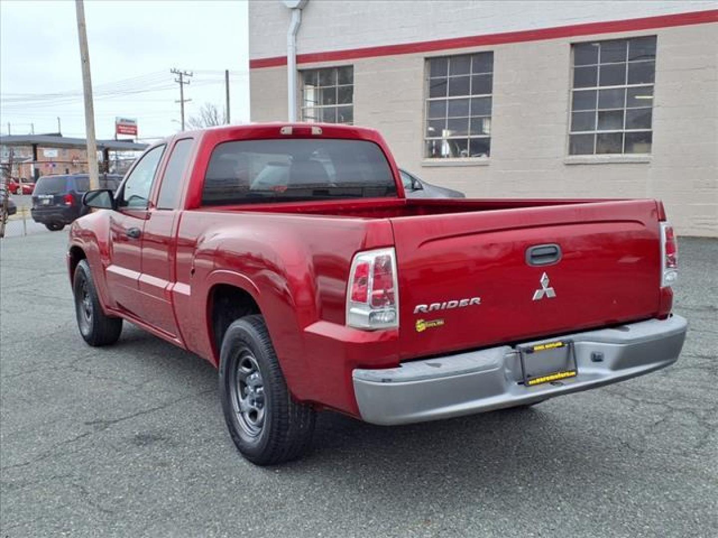 2008 Lava Red Mitsubishi Raider LS (1Z7HC22K38S) with an 3.7L 3.7L V6 210hp 235ft. lbs. Fuel Injected engine, 4-Speed Automatic transmission, located at 50 Eastern Blvd., Essex, MD, 21221, (410) 686-3444, 39.304367, -76.484947 - Photo#2