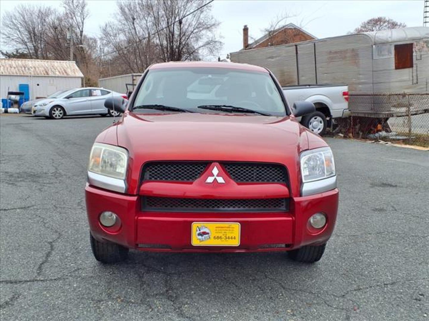 2008 Lava Red Mitsubishi Raider LS (1Z7HC22K38S) with an 3.7L 3.7L V6 210hp 235ft. lbs. Fuel Injected engine, 4-Speed Automatic transmission, located at 50 Eastern Blvd., Essex, MD, 21221, (410) 686-3444, 39.304367, -76.484947 - Photo#7