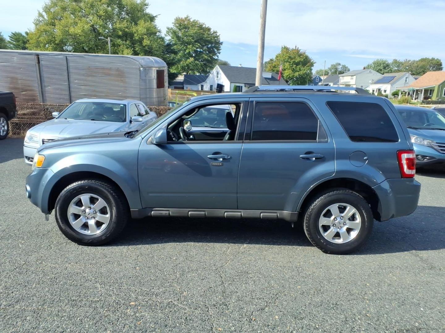 2012 Blue Ford Escape Limited (1FMCU9EG1CK) with an 3.0L 6 Cylinder Sequential-Port F.I. engine, Automatic transmission, located at 50 Eastern Blvd., Essex, MD, 21221, (410) 686-3444, 39.304367, -76.484947- Photo#1