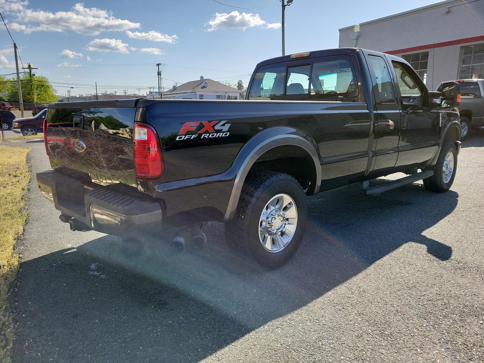 2008 Black - UD /Black - A Ford Super Duty F-250 XLT (1FTSX21R88E) with an 6.4L OHV V8 TURBO-DIESEL POWER STROKE ENGINE engine, located at 50 Eastern Blvd., Essex, MD, 21221, (410) 686-3444, 39.304367, -76.484947 - <p>As powerful and efficient as it is stylish, our 2008 Ford Super Duty F-250 XLT SuperCab 4X4 in Black is ready to get to work. Powered by a TurboCharged 6.4 Liter PowerStroke Diesel V8 that delivers 350hp on command paired with a durable Automatic transmission. This Four Wheel Drive boasts incredi - Photo #3