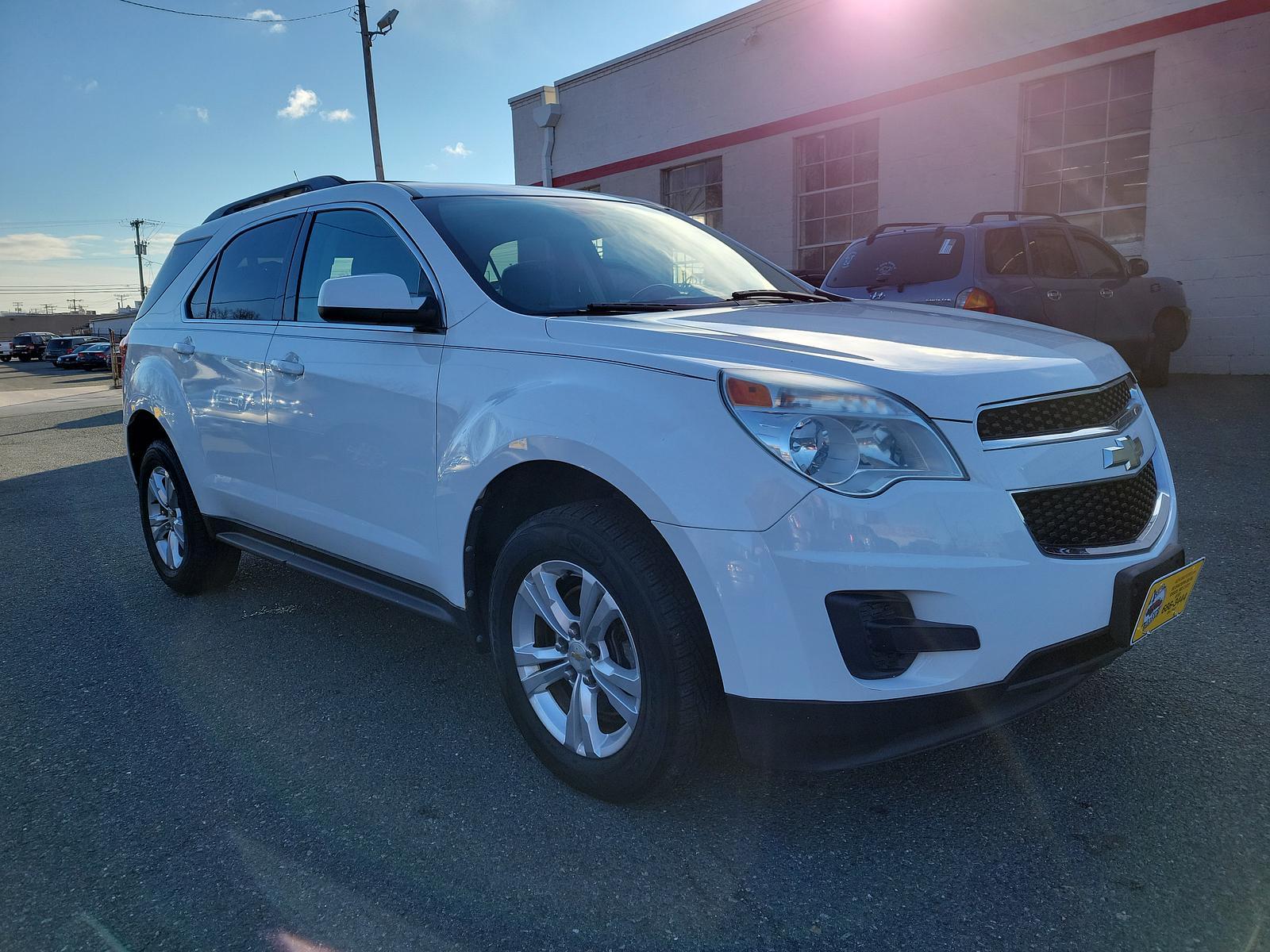 2011 Summit White - GAZ /Jet Black - AFJ Chevrolet Equinox LT w/1LT (2CNFLEEC3B6) with an ENGINE, 2.4L DOHC, 4-CYLINDER SIDI (SPARK IGNITION DIRECT INJECTION) engine, located at 50 Eastern Blvd., Essex, MD, 21221, (410) 686-3444, 39.304367, -76.484947 - <p>A practically perfect blend of utility, efficiency, and space, our 2011 Chevrolet Equinox 1LT AWD in Summit White takes you down the road with style and finesse! Powered by a 2.4 Liter 4 Cylinder that offers 182hp while paired with a smooth-shifting 6 Speed Automatic transmission. With this All W - Photo #2
