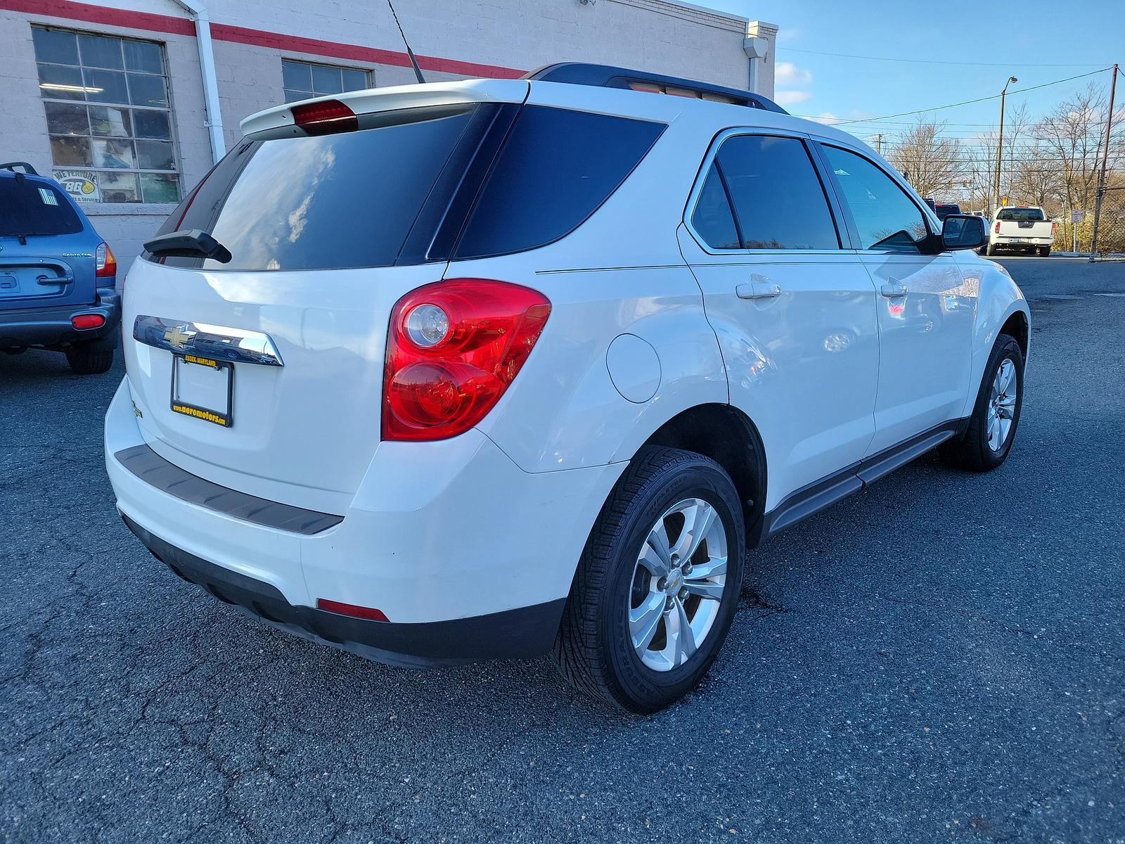 2011 Summit White - GAZ /Jet Black - AFJ Chevrolet Equinox LT w/1LT (2CNFLEEC3B6) with an ENGINE, 2.4L DOHC, 4-CYLINDER SIDI (SPARK IGNITION DIRECT INJECTION) engine, located at 50 Eastern Blvd., Essex, MD, 21221, (410) 686-3444, 39.304367, -76.484947 - <p>A practically perfect blend of utility, efficiency, and space, our 2011 Chevrolet Equinox 1LT AWD in Summit White takes you down the road with style and finesse! Powered by a 2.4 Liter 4 Cylinder that offers 182hp while paired with a smooth-shifting 6 Speed Automatic transmission. With this All W - Photo #3