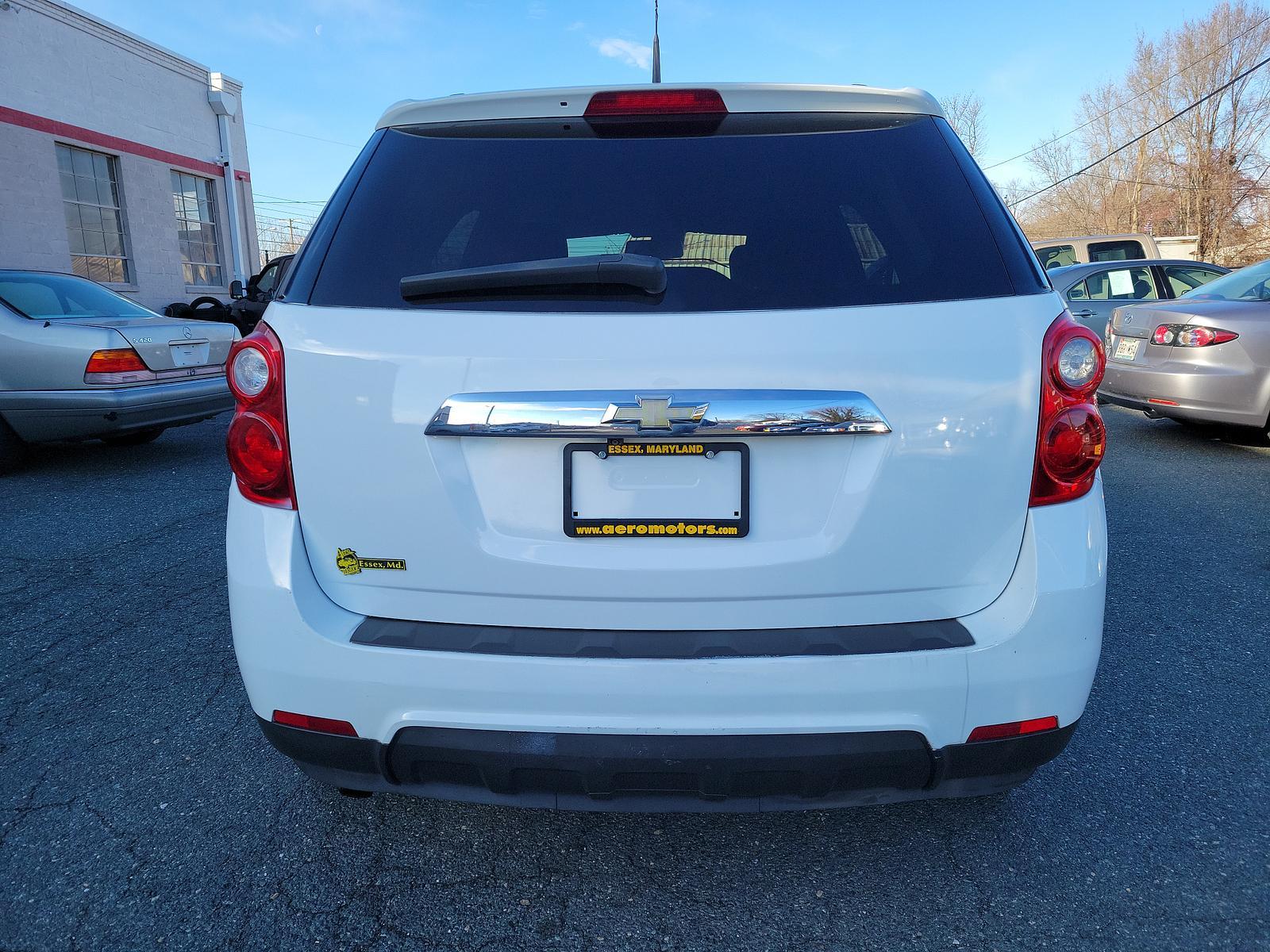 2011 Summit White - GAZ /Jet Black - AFJ Chevrolet Equinox LT w/1LT (2CNFLEEC3B6) with an ENGINE, 2.4L DOHC, 4-CYLINDER SIDI (SPARK IGNITION DIRECT INJECTION) engine, located at 50 Eastern Blvd., Essex, MD, 21221, (410) 686-3444, 39.304367, -76.484947 - <p>A practically perfect blend of utility, efficiency, and space, our 2011 Chevrolet Equinox 1LT AWD in Summit White takes you down the road with style and finesse! Powered by a 2.4 Liter 4 Cylinder that offers 182hp while paired with a smooth-shifting 6 Speed Automatic transmission. With this All W - Photo #4